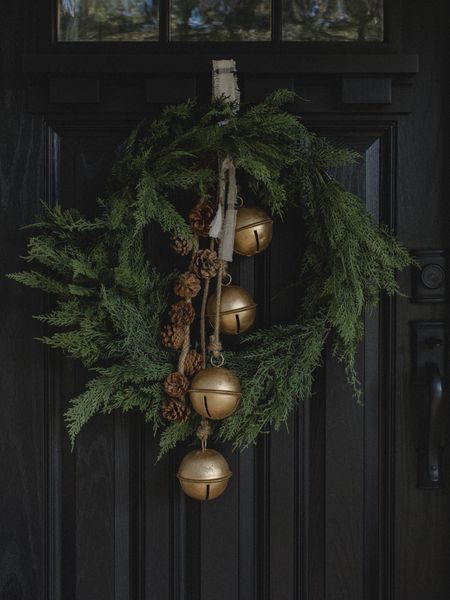 faux Christmas cedar wreath, large brass bells 🌲 

#LTKHoliday #LTKhome #LTKSeasonal