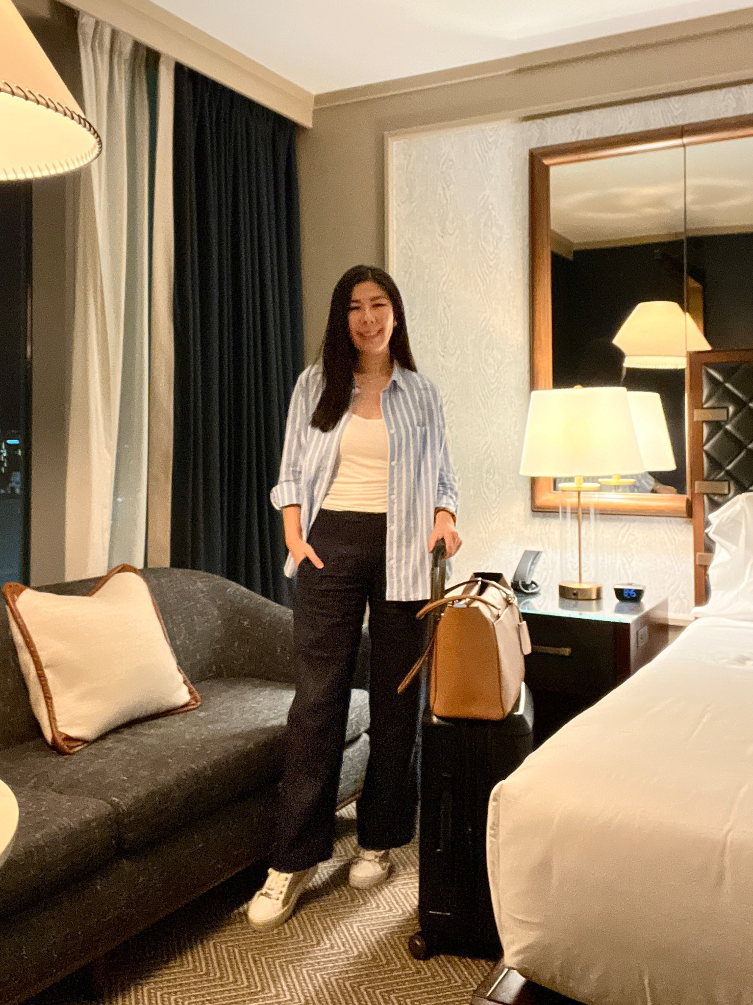 These days, I value comfort in the sky but I still want to look chic! When I went to OKC, I wore these navy blue linen pants that are breathable and lightweight along with a simple white tank top and an oversized striped collar shirt. The roominess of these pieces added to their practicality for  air travel! #ootd #traveloutfit #linenpants #oversizedshirt #frequentflyer 

#LTKootd #LTKTravel #LTKPetite