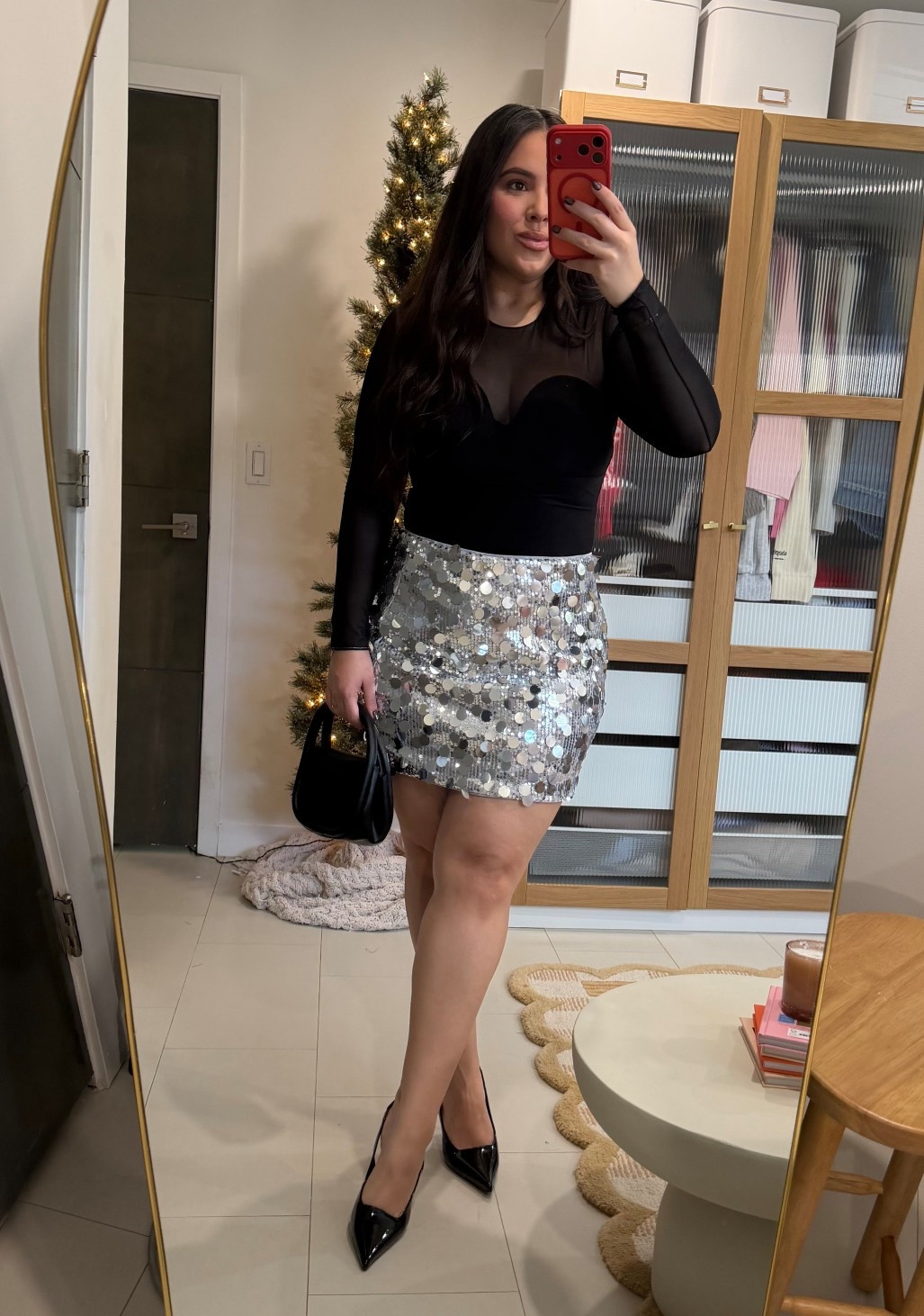 This bodysuit smooths everything out and the sparkly skirt is such a fun statement for NYE parties, dinner, or a night out. I’m obsessed! 

Wearing size L

#LTKHoliday #LTKootd #LTKSeasonal