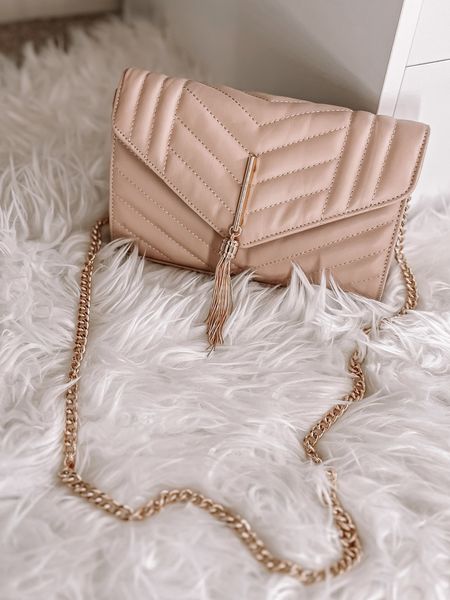 ysl similar style crossbody handbag can be converted to be a clutch with no chain. color is technically ‘pite’ (pink) but bag reads very neutral in person. can be matched to tons of outfits. an excellent wedding guest outfit bag with lots of room and card slots. very chic handbag!

also comes in red for the holidays!!🎄

#LTKwedding #LTKfindsunder50 #LTKitbag