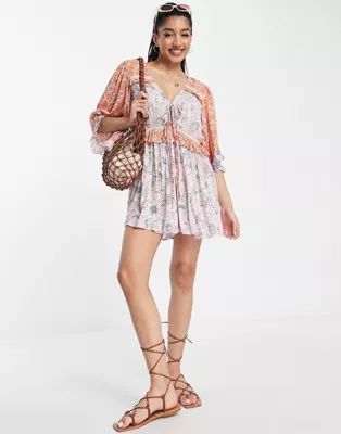 ASOS DESIGN lace insert tie front romper in mixed floral print | ASOS (Global)