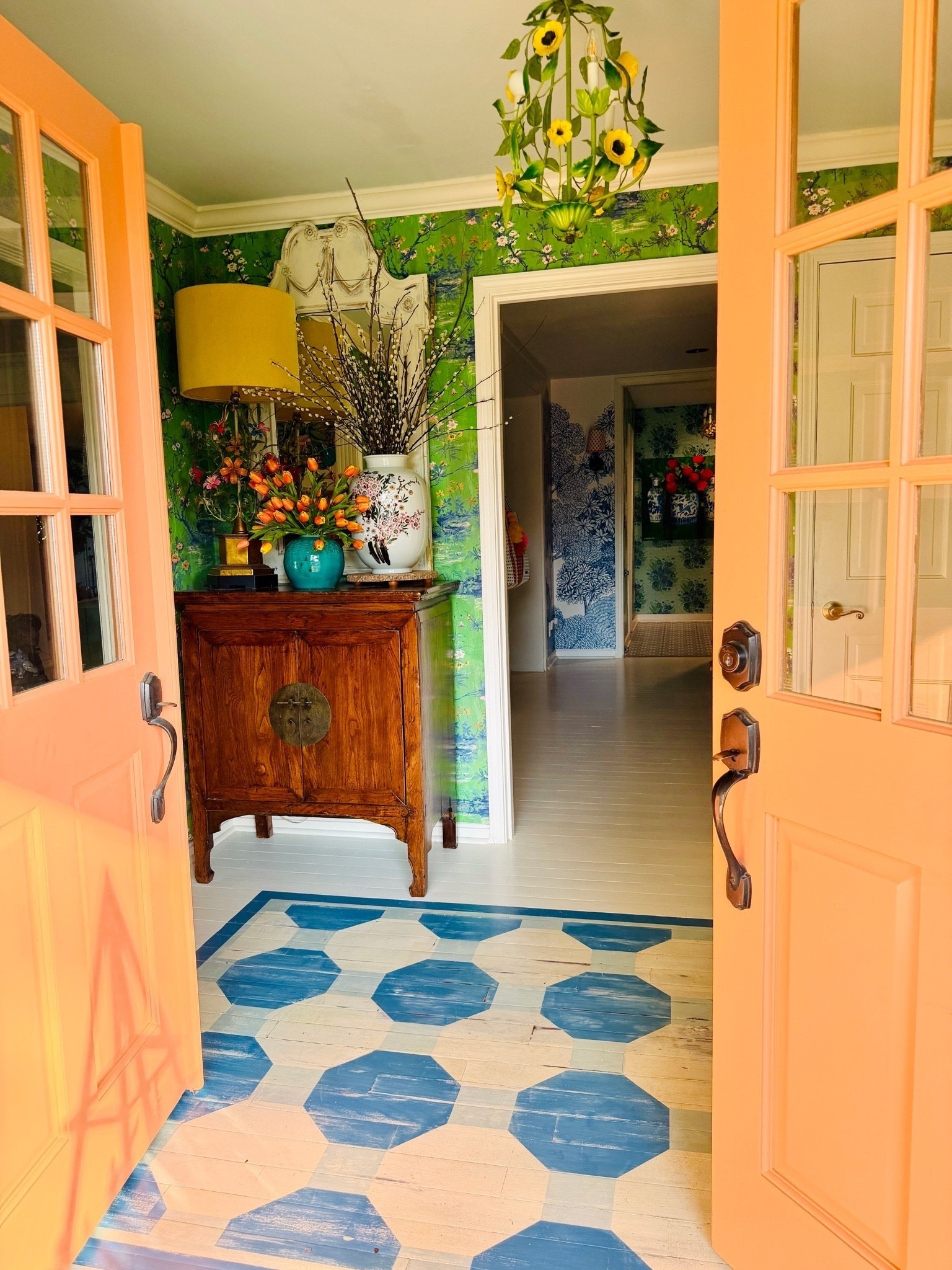 One of my favorite DIYs in our home! We painted this “rug” directly onto our entryway floor. It took lots of measuring, taping and patience—but it completely transformed the space. I linked the paint and supplies we used! 💙🎨 Bonus door color is linked too!