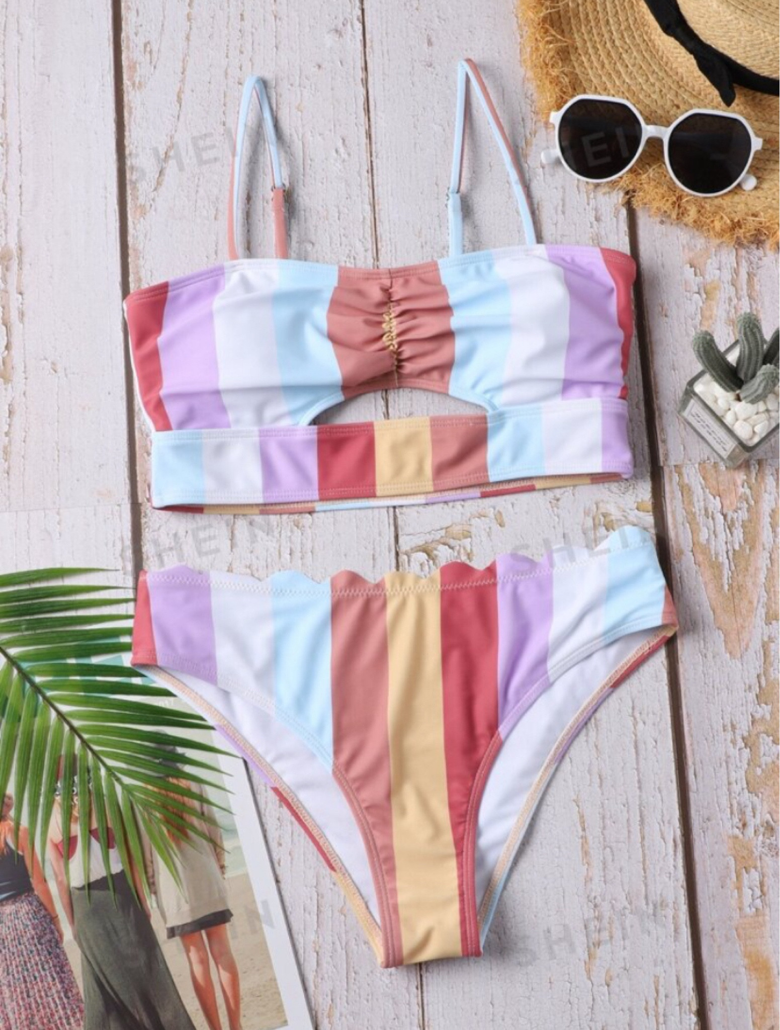 Currently sitting poolside in this colorful striped two-piece / bikini swimsuit. The scalloped detail on the bottoms is sooo good!

For quality, I give it a 6/10, but it’s $12 soooooo I give it 👍🏻👍🏻!

(FYI the colors are summer, not soft autumn)