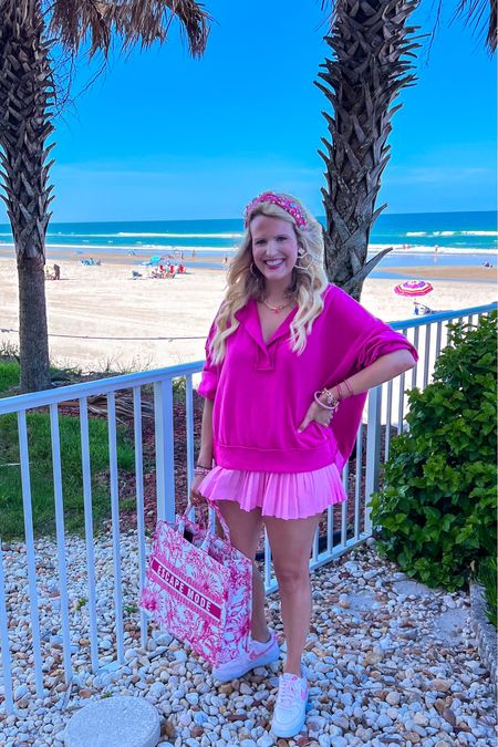 Barbie pink pullover 
Fall pullover
Oversized sweater
Tennis skirt 
Nike Air Force 
Pink sneakers
Pink tote bag
Pink bracelet stack
Barbie bracelets
Heart earrings 
Travel outfit 
Comfy outfit 
Casual outfit 

#LTKstyletip #LTKunder50 #LTKshoecrush