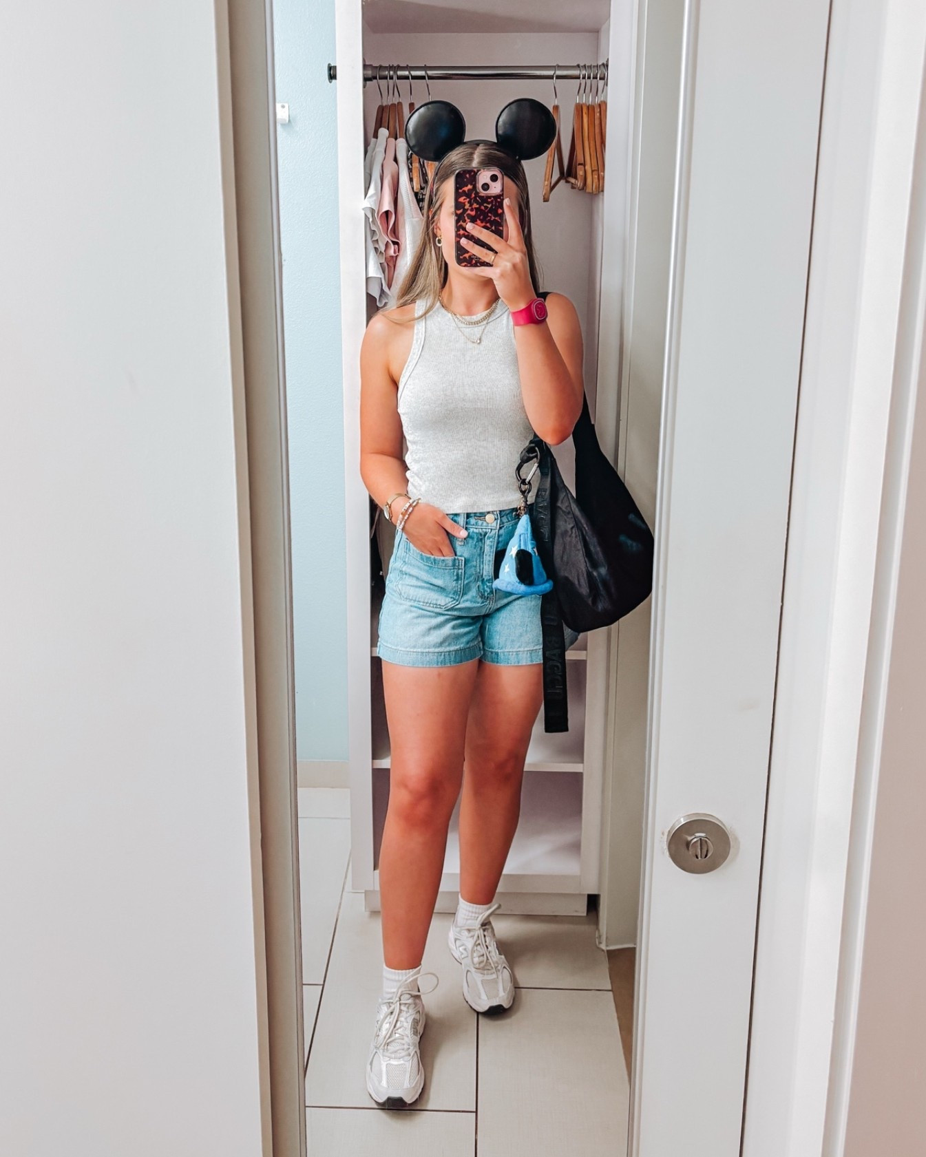 summer outfits inspiration for Disney world trip - it is hot hot hot at Disney in the summer time and dressing appropriately is key!! I love a simple tank with Jean shorts and new balance 530s for a park day for a cute and casual look 

#disneyworld #disneyparkday #summeroutfit

#LTKPetite #LTKSeasonal #LTKootd