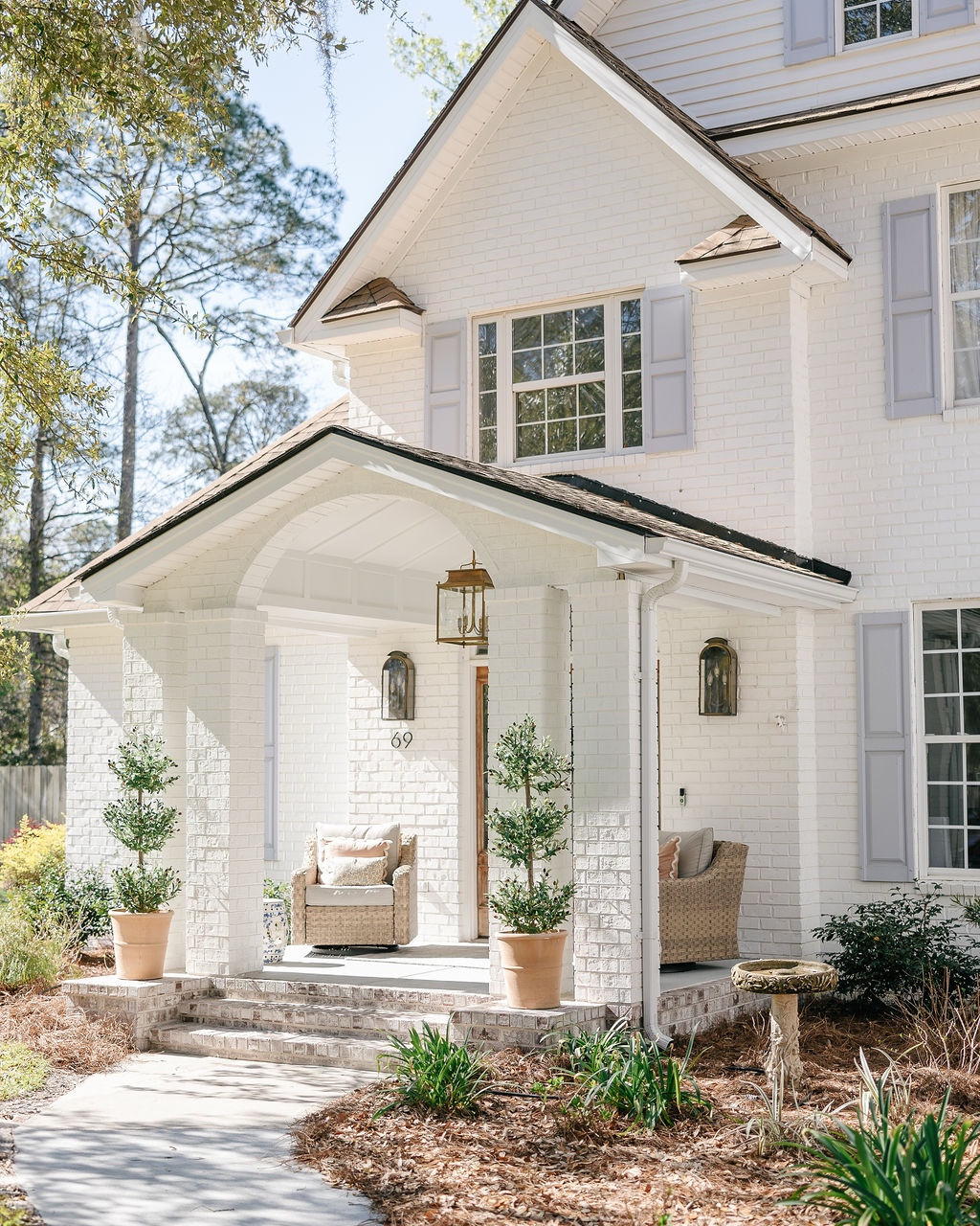 Isn’t she gorgeous!? Our new front porch is a dream come true. I sit out here allll the time. We’ve had meals out here, taken naps, and just sat and chatted for hours. My husband jokes and said we needed a porch for all of my packages. And he’s not wrong. But it’s definitely so much more than that! Swipe for a little reminder of where we started when we first bought this house..

#LTKHome #LTKSeasonal