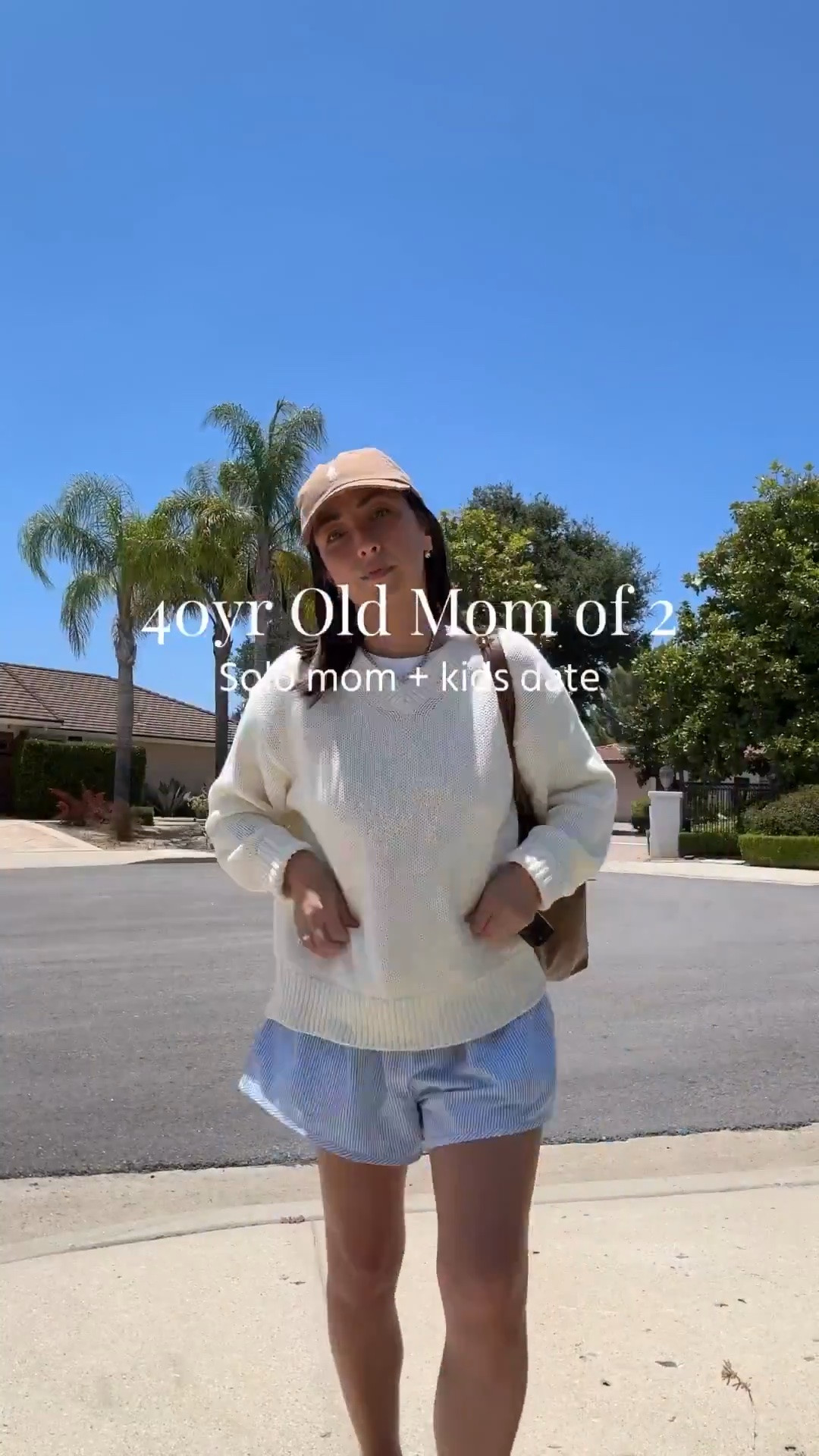 Easy mom outfit for a day of solo parenting. Loving this sweater and shorts weather. 

J.Crew tee medium
Artizia sweater xs
Recreational Habits shorts medium
Reformation flats 5
Polo Ralph Lauren hat
Mansur Gavriel tote
Dorsey James necklace 15"
Electric Picks earrings

petite style, summer outfits, summer style

#LTKmomlife #LTKPetite #LTKootd