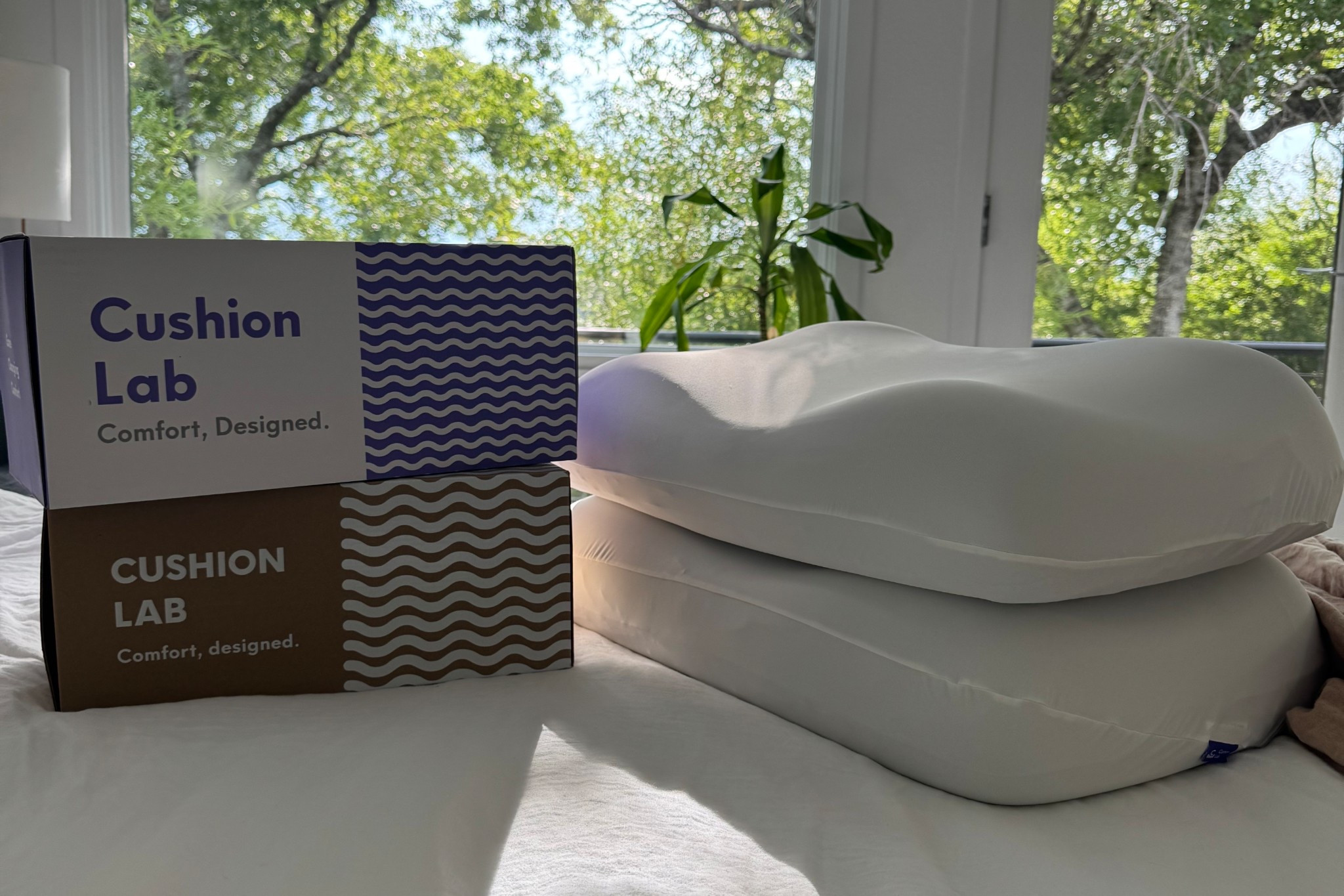 The pillow that will help you sleep on your back to avoid neck wrinkles! One side is for back sleeping and the other side with higher bolsters is for side sleepers and comes with a super soft fitted pillow cover.  I cannot recommend this pillow enough, it has changed my life!! I bought the travel size which is smaller for my toddler and she absolutely loves it too!

#LTKFamily #LTKHome #LTKKids