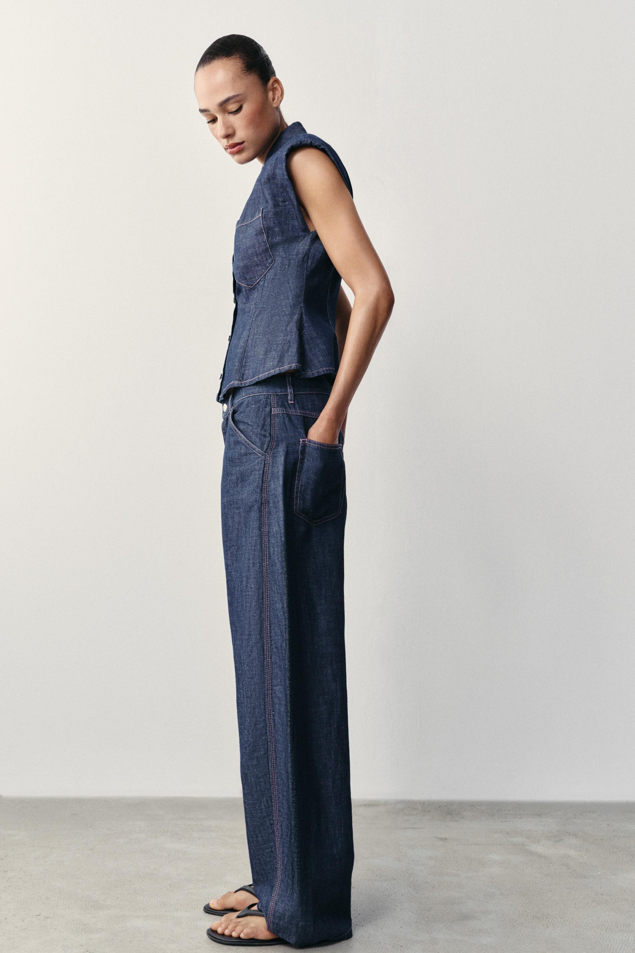 Linen blend shirt with a regular collar and sleeveless design with shoulder pads. Featuring front... | Zara UK