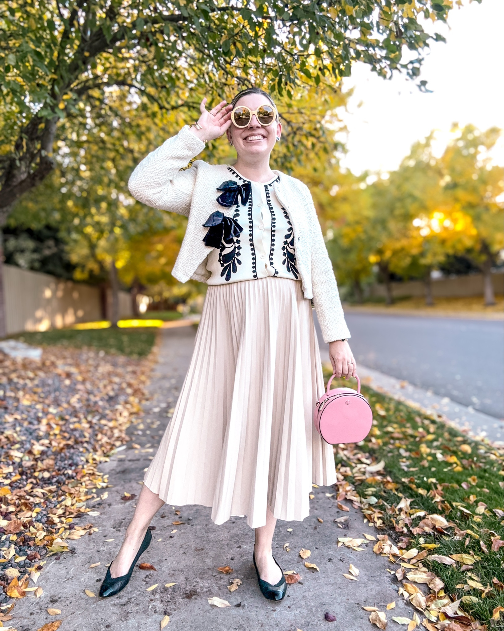 Look 9 - The Coco Cabana ☕️ 
A curated style series

Fall has never been my favorite season weather-wise (especially in CO - I think it’s boring 🤷🏼‍♀️ ), but it really is such a great one for fashion - especially when it comes to textures and fabrications. What I love about this outfit is how those textures come together: the faux leather skirt, the tweed jacket, and that beautiful balance of structure and softness.

Cream isn’t the first color that comes to mind for autumn, but that’s exactly what makes it interesting to me. 🤍 I think it’s fun to play with expectations and remind ourselves that just because you buy something during a season doesn’t mean it has to stay in that season. This look could easily come back for spring and perhaps it will… 👀 . I love incorporating trending colors into my looks - but a classic is a classic for a reason.

This look is part of my Coco Cabana capsule   a two-week collection of feminine, classic, and playfully preppy pieces in black, white, and vibrant pops of color. Each capsule in my series explores a distinct theme, featuring 10–20 curated outfits designed to inspire new ways to mix, match, and restyle your favorites. 💫

Jacket - Avec Les Filles (rent from Nuuly! Use my coupon below for a discount)
Sweater top - Avara (linked + other colorways linked as well!)
Skirt - Ann Taylor (similar & 2nd hand linked)
Flats - Chanel (similar linked)
Sunglasses- Gucci (linked)
Earrings - Chanel (similar linked)
Bracelets - Rocksbox & Vintage
Bag - Kate Spade (2nd hand linked)
Rings - Kate Spade (2nd hand linked)

Get $30 off of your first month of Nuuly: https://share.nuuly.com/kat42828
Link in IG bio as well. :) 

#CocoCabanaCapsule #LTKStyle #FallFashion #PreppyWithAPop #ClassicWithATwist #OOTD #LTKFashion #FallStyle

#LTKStyleTip #LTKSeasonal #LTKSaleAlert