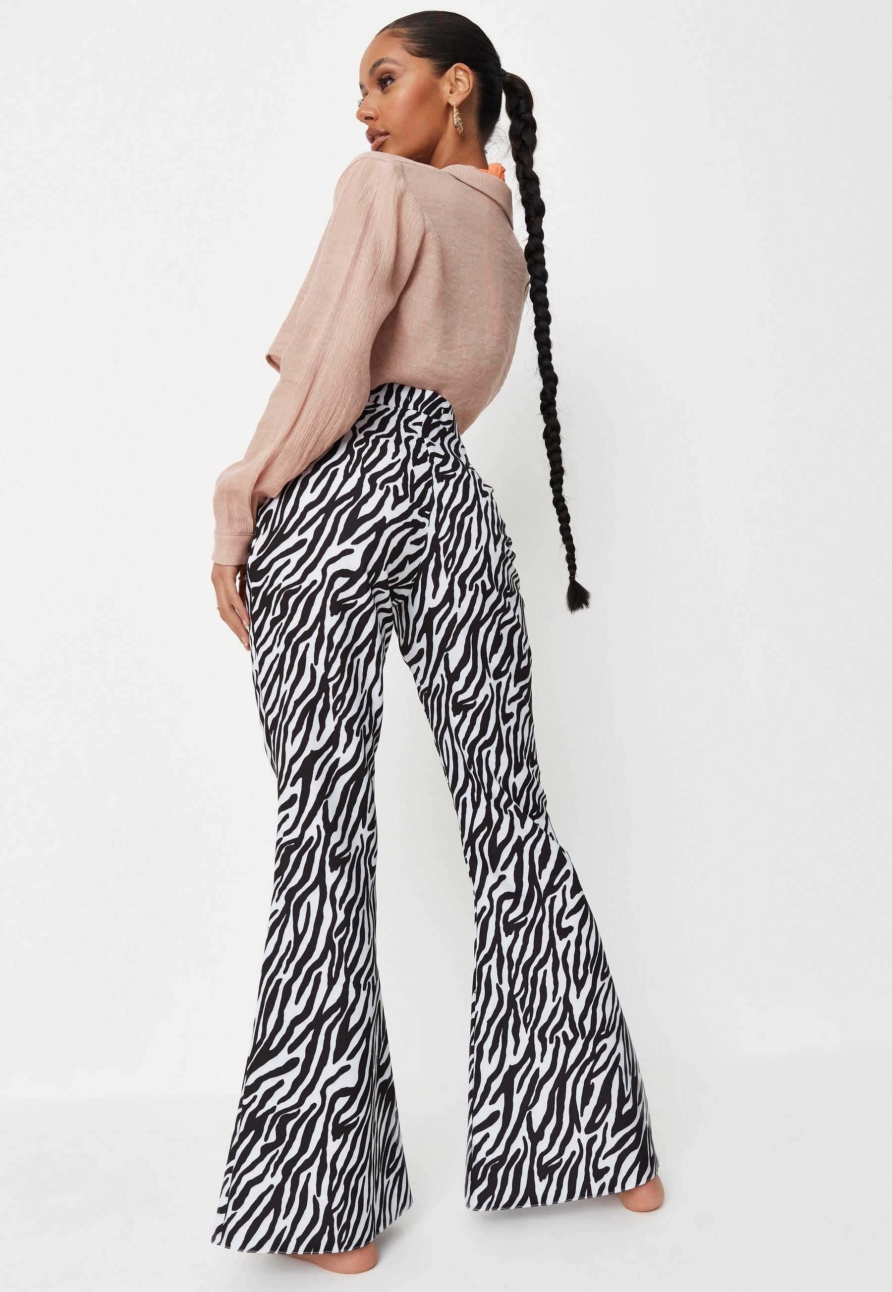 Black Zebra Print Split Front Flared Pants | Missguided (US & CA)