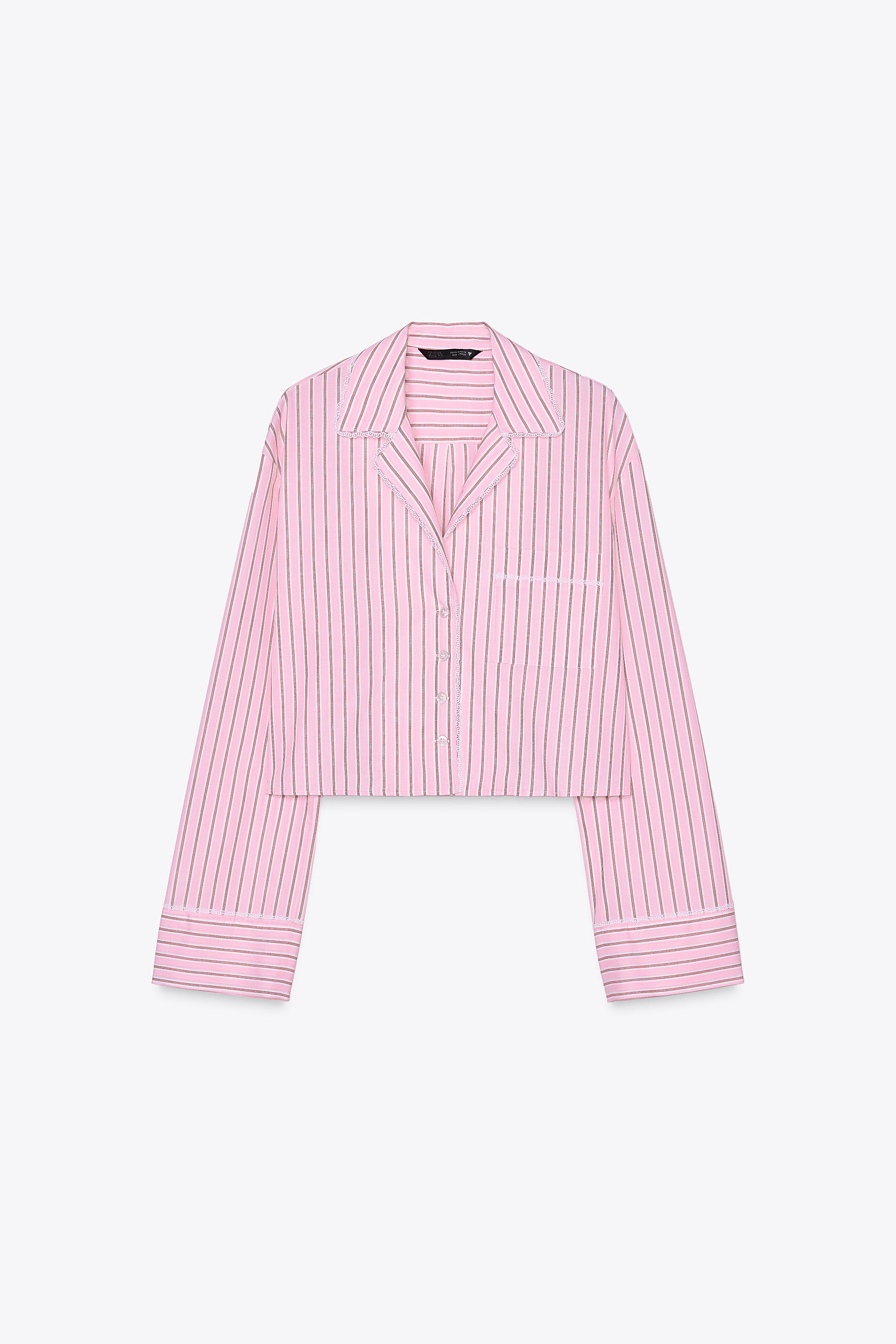 Cropped shirt with lapel collar and V-neck. Long sleeves. Contrasting lace trim detail. Chest pat... | Zara US