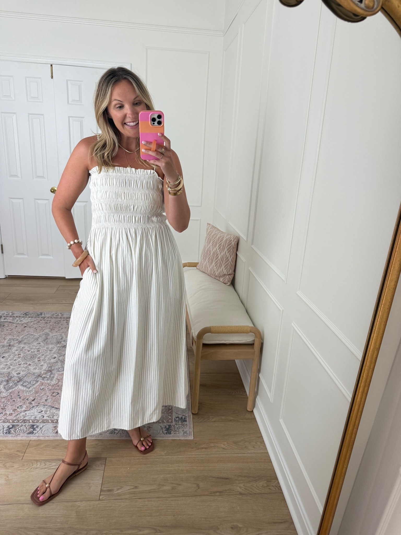 I have this in multiple colors now! Such a good summer dress! Wearing a med