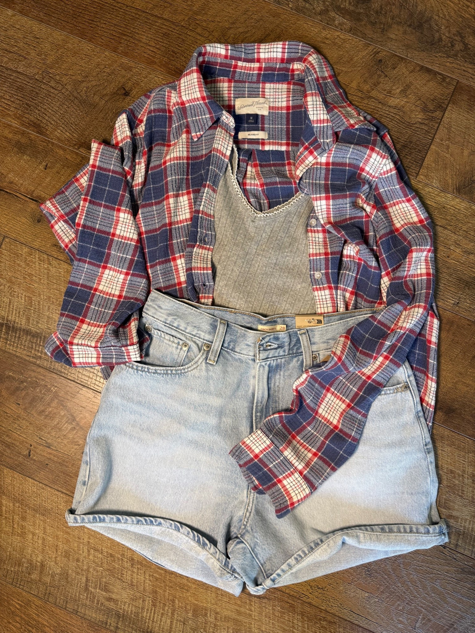 Target outfit that is making me so happy! 
5’7”/140 Size 28 in the cinched waist Levi’s 
Small in the gray tank and medium in the flannel. This flannel is 10/10. 

#LTKmomlife #LTKootd #LTKSeasonal