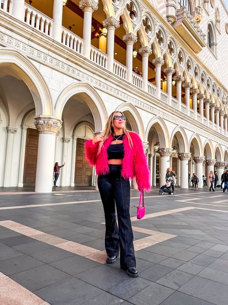 Pink faux fur jacket
Black flare suede pants from Spanx
Pink outfit
Vegas outfit
Vegas fashion
Streetstyle 

#LTKtravel #LTKSeasonal #LTKHoliday