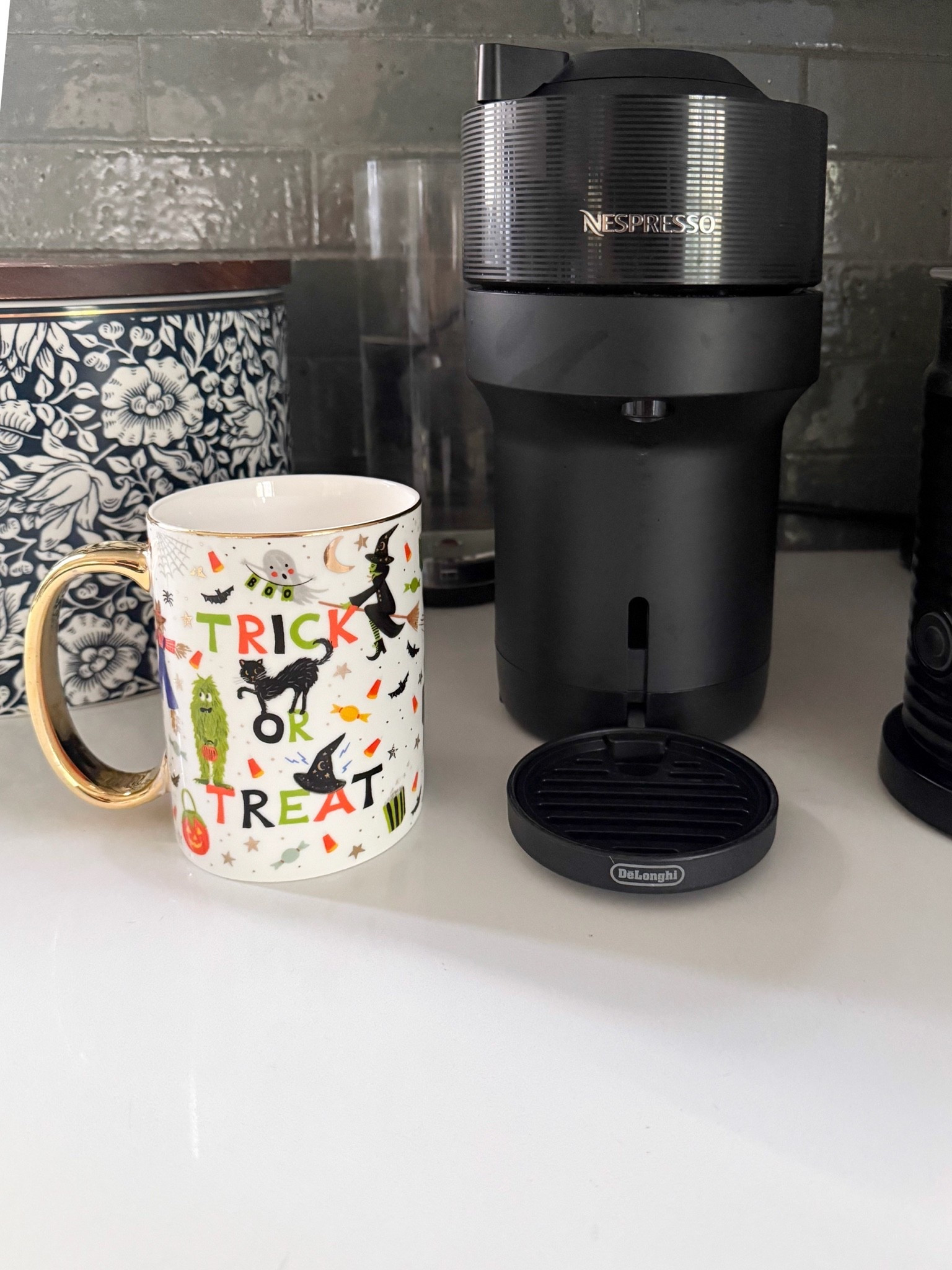 My Nespresso machine makes everyday coffee at home feel like a little treat, especially during the fall. Pair it with the cutest Trick or Treat mug, and your morning coffee just got a festive Halloween update!

Nespresso coffee machine, Nespresso maker, Trick or Treat mug, Halloween coffee mug, fall coffee essentials, at home coffee bar, Halloween kitchen decor, seasonal mugs, coffee lover gifts, fall kitchen finds, cozy morning routine, girlonthehudson