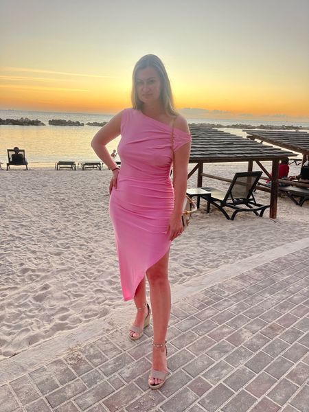 A Norma Kamali dress is perfect for a tropical island or a summer wedding. 
Scored this one on sale and loved wearing it! 

#LTKtravel #LTKfindsunder100 #LTKwedding