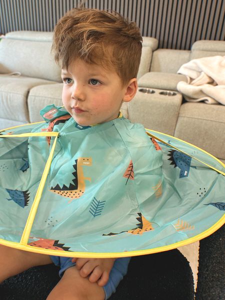 this dinosaur hair cut cape umbrella is amazing for kids haircuts at home! Catches all the hair and sits at the perfect height  

#LTKKids #LTKFamily
