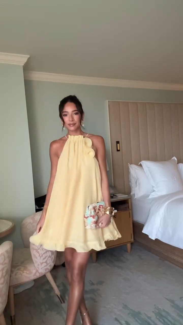 how gorgeous is this yellow mini dress for vacation! The movement, the shape, the rosette details - perfect outfit for dinner and drinks at the beach! Wearing an XS in yellow dress, shade unbothered bronze in body glow (code: NENA to save)

#grwm #palmbeach #vacationoutfit #holidayoutfit #beachoutfit #butteryellow

#LTKStyleTip #LTKTravel