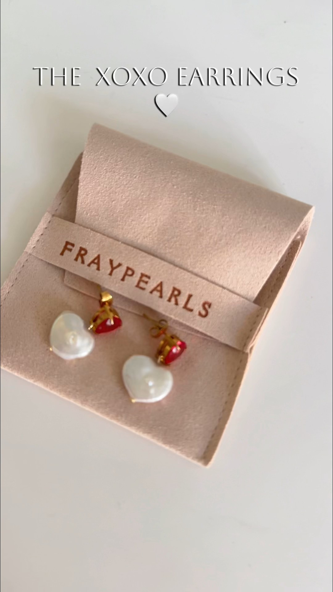 Fray Pearls handcrafted jewelry in Charleston SC. The Be Mine Valentine’s Day Collection. These are the Scarlet Hearts- ed heart stud paired with a natural freshwater pearl heart drop. 

#LTKValentine