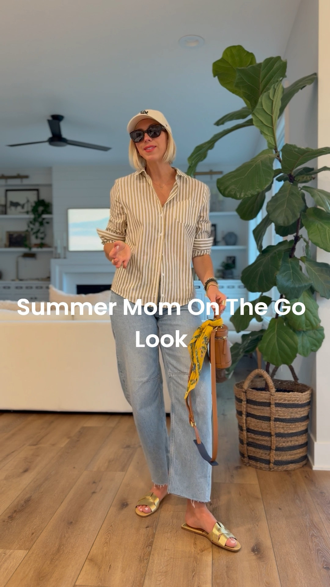 Simple and chic summer denim look with an easy breezy linen button up shirt, metallic sandals for some polish, a baseball cap for a sporty, touch and elegant sunglasses & handbag to finish the look. This linen shirt is such a great staple piece. It does run small - I sized up in this one.

#LTKSummerEdit #LTKOver40 #LTKStyleTip