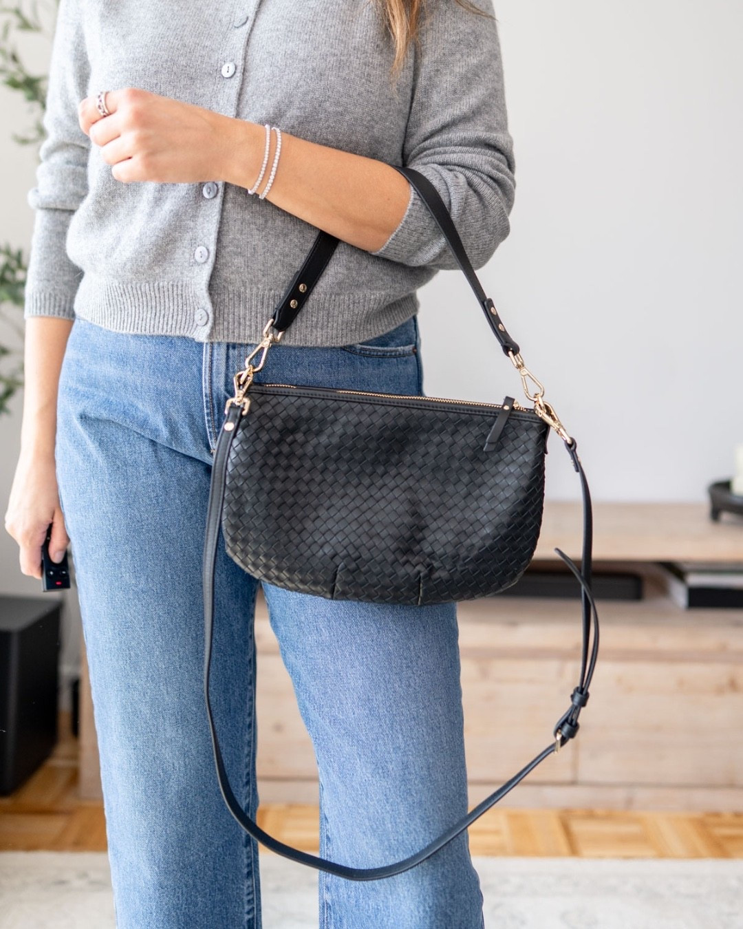 Black woven shoulder bag, everyday crossbody bag, affordable designer inspired bag, black handbag, fall handbag trend, classic everyday purse, woven handbag, chic shoulder bag, neutral accessories, fall fashion finds

The perfect everyday black bag 🖤 The woven texture and gold details make it feel elevated while still being easy to wear with everything.

#LTKWorkwear #LTKmomlife #LTKSeasonal
