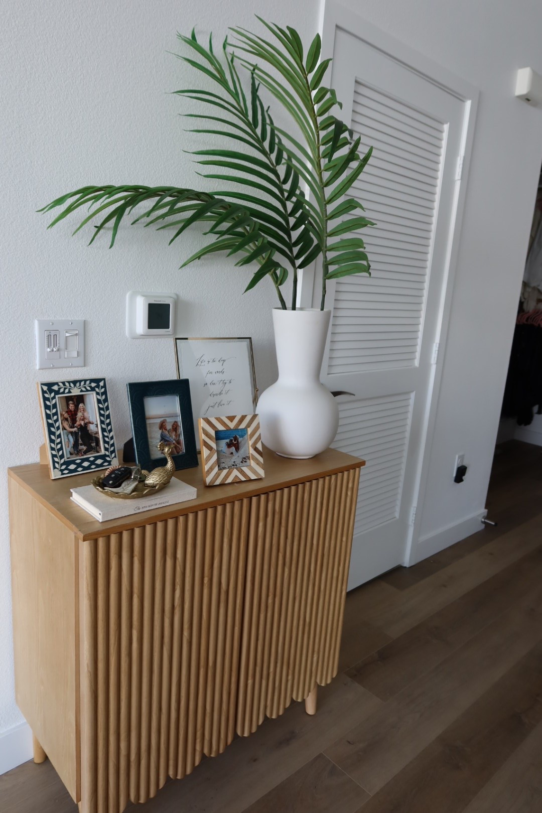 Cutie little entry wall table. Love the extra storage! This scalloped cabinet is Haute Home LA but linked some very similar 🫶

#LTKFindsUnder50 #LTKHome #LTKFindsUnder100