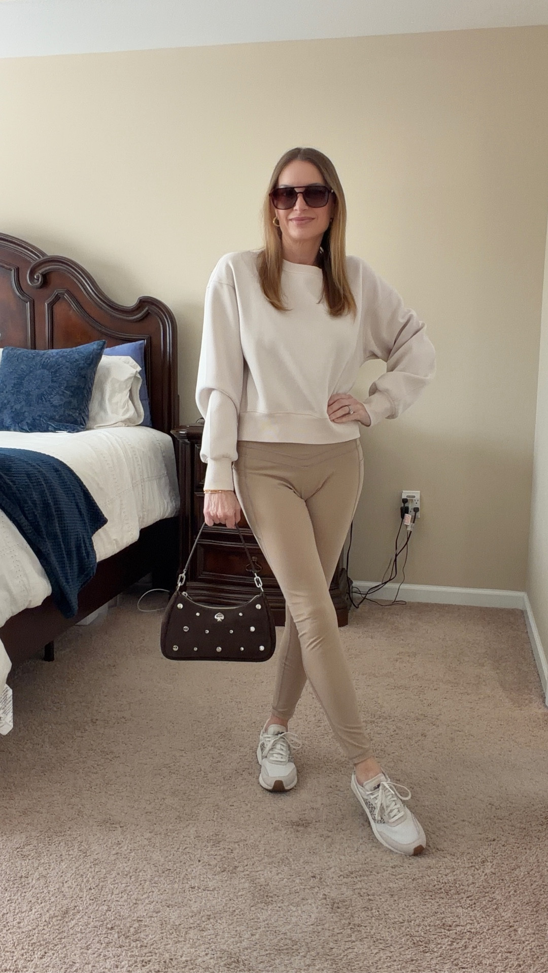 Today’s cozy outfit — my fleece‑lined pullover that’s soft, wrinkle‑resistant, washes perfectly, and has thumb holes (my favorite). Paired it with my IUGA leggings with pockets — high‑waisted, tummy‑control, no front seam, and so buttery soft. Added New Balance sneakers, gold jewelry, sunglasses, and my suede Kate Spade crossbody for an easy, everyday look. Everything linked for you. 🤍

#cozyoutfit  
#leggingswithpockets  
#tummycontrolleggings  
#everydayoutfitideas  
#casualstyleforwomen

#LTKootd #LTKActive #LTKgrwm