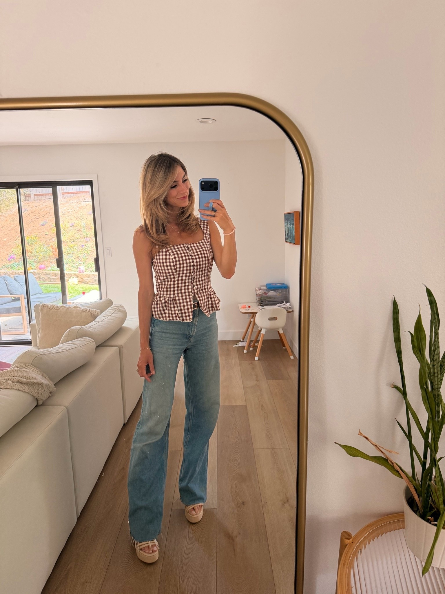 Simple summer outfits are my favorite. 🤎 and will be cute in fall too! This gingham top + my favorite high-waisted Zara jeans is one of those combinations I reach for. Finished it off with my go-to platform sandals and brown belt from Lulus. Wearing a size 25 in the jeans and an XS in the top. This exact top is sold out but linked similar 

Zara jeans, Zara high-waisted jeans, wide leg jeans, gingham top, brown gingham top, summer outfit, casual summer style, coastal style, neutral outfit, platform sandals, Lulus sandals, brown belt, everyday outfit, effortless style, mom style, chic casual outfit, date night outfit, brunch outfit, elevated basics, teacher outfit

#LTKOver40 #LTKootd #LTKWorkwear