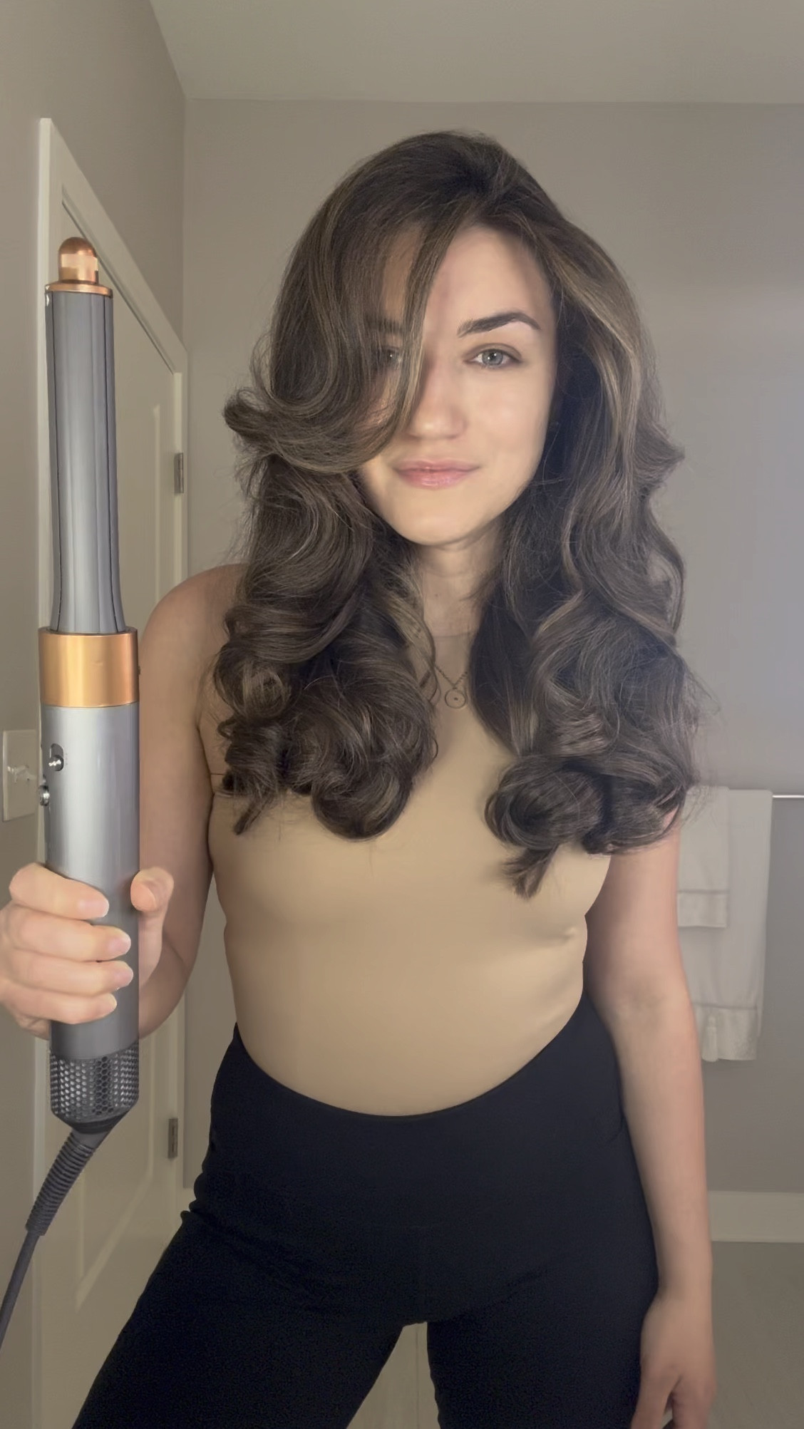 My favorite hairstyle on the airwrap of all time.

 This hair would not be possible without, my new + now all-time favorite, @unite_hair elevate mousse. I achieved this look with only TWO products, both gifted to me by Unite.
.
Here’s how I got the look:
- start with @unite_hair 7SECONDS Detangler
- add @unite_hair Elevate mousse to damp hair 
- rough dry 85% dry 
- section hair into two
- take a 2 inch section and apply more mousse. This will add moisture to your now, mostly dry, hair and help lock in the curl. You will do this for EACH curl, focusing on applying the mousse to the under side of your hair.
- using the 1.2 barrel curl up horizontally. Start with high heat and then switch the medium heat as you need to bring the airwrap up as close to your scalp as possible for added volume at the root. Hold about 45-60 seconds. Then cool shot for equal time. 
- release hair, pin curl up. Repeat for entire head
- once you reach your fringe, curl for half the time, but same direction (horizontally and in toward your face)
- flip head over, shake out curls and…you’ll have the best hair you ever saw ☺️
.
@dysonbeauty @dysonusa @dysonhairpro @ultabeauty 
#hair #hairideas #hairtutorial #hairtutorials #blowout #blowoutstyles #hairtransformation #hairtips #hairtipsandtricks #bighair #longhairstyle #longhairstyles #dyson #dysonhair #mydyson #dysonairwrap #airwrap #airwraptutorial #unitehair #unitefamily #mousse #hairproducts #detangler #wetbrush #mobhair #beyoncehair #curls #weddinghair #weddinghairstyles #sidepart

#LTKbeauty #LTKVideo #LTKstyletip