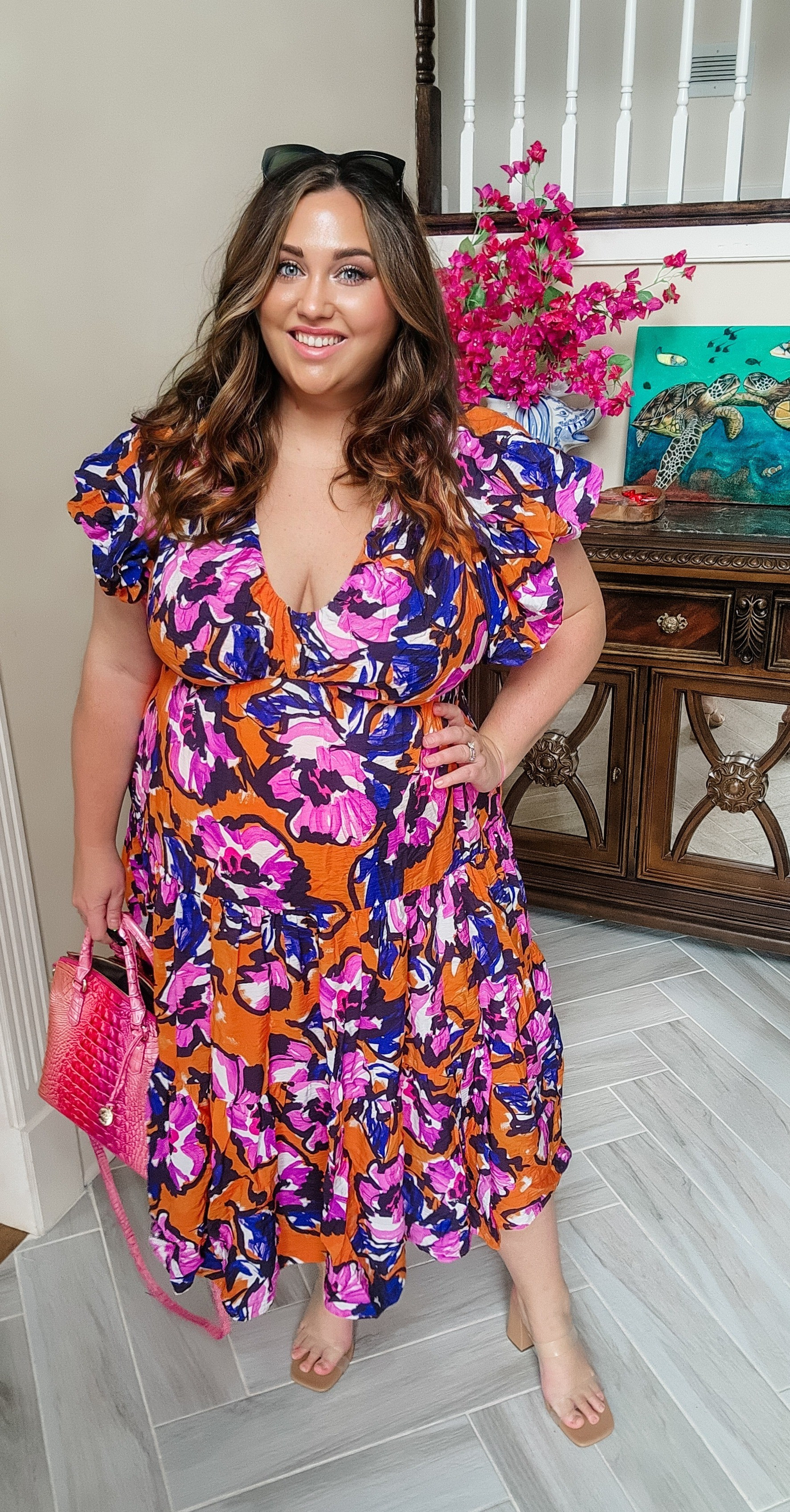 Hands down my favorite dress I have received at my house lately! This is flowy and fits great. it also hides a lot Love the bright colors as well! This runs a TTS 

#LTKover40 #LTKplussize #LTKmidsize