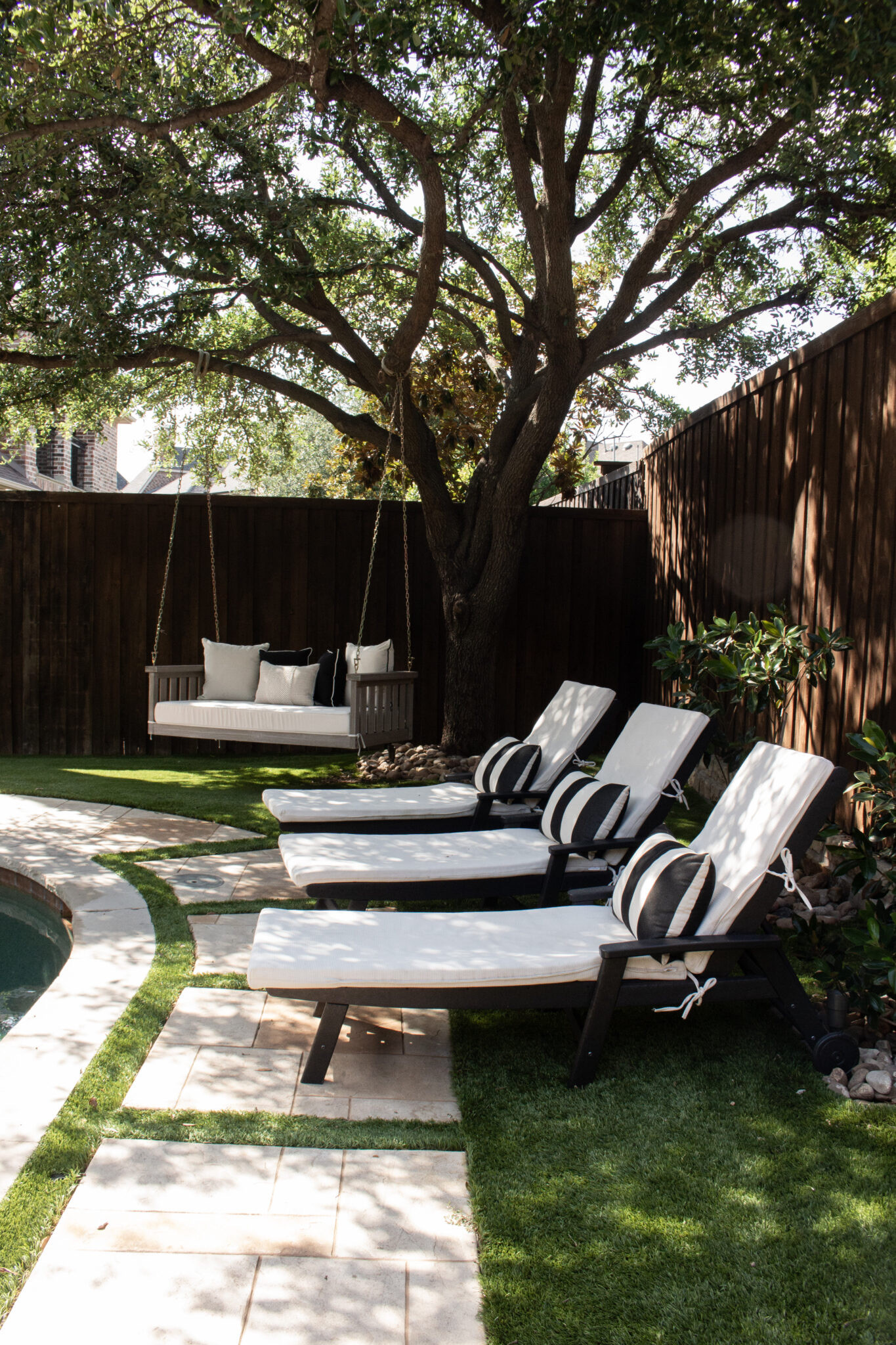 Outdoor decorating inspiration you'll want to save! This transitional backyard combines classic black and white decor, comfortable seating, timeless outdoor furniture, and beautiful styling for the ultimate entertaining space.

#LTKSeasonal #LTKHome