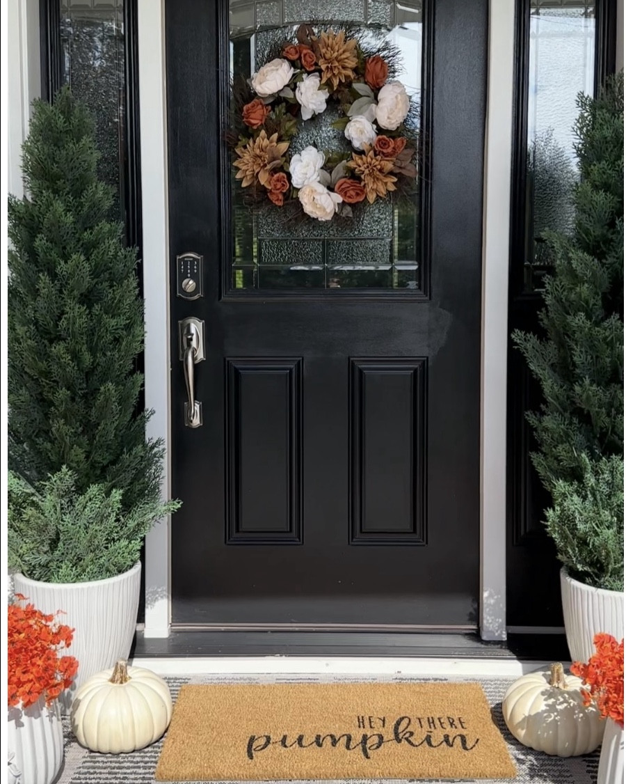 Fall porch with 2 different wreaths and fall door mats! Shop pretty wreath on sale, greenery trees, small bushes, faux fall florals, pumpkins, outdoor rugs, planters. 

#LTKSeasonal #LTKHome #LTKFindsUnder50