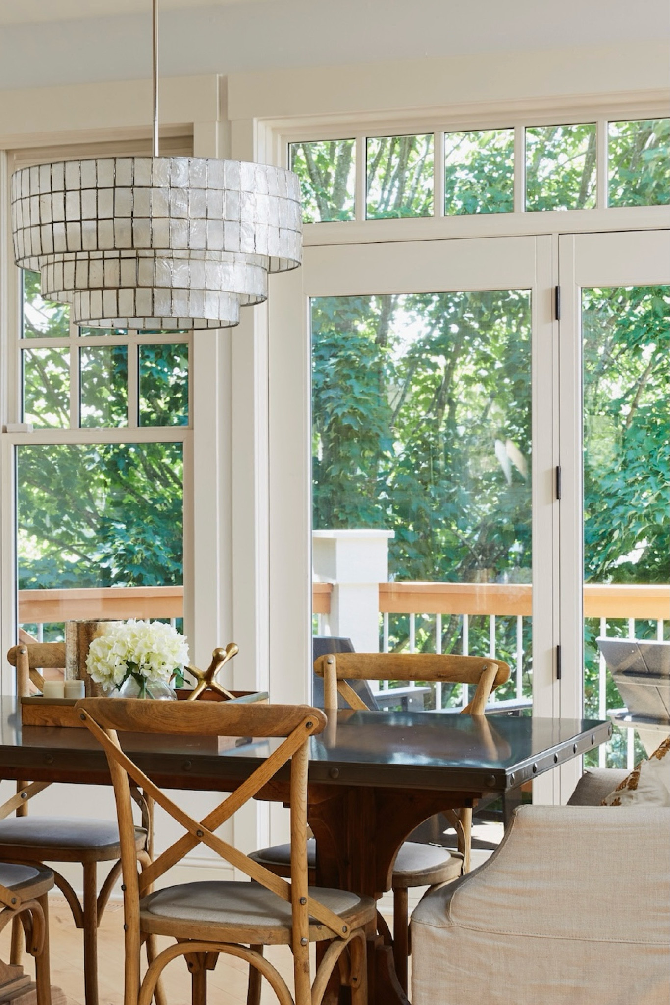 My capiz tiered chandelier from West Elm is currently 20% off for Memorial Day! Complete with natural capiz shells and a polished nickel finish. It completes our dining room. 

#LTKStyleTip #LTKHome #LTKSaleAlert