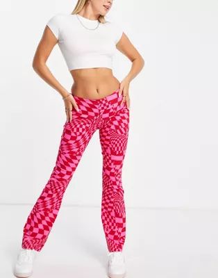 ASOS DESIGN bengaline flare pants in pink and red check | ASOS (Global)