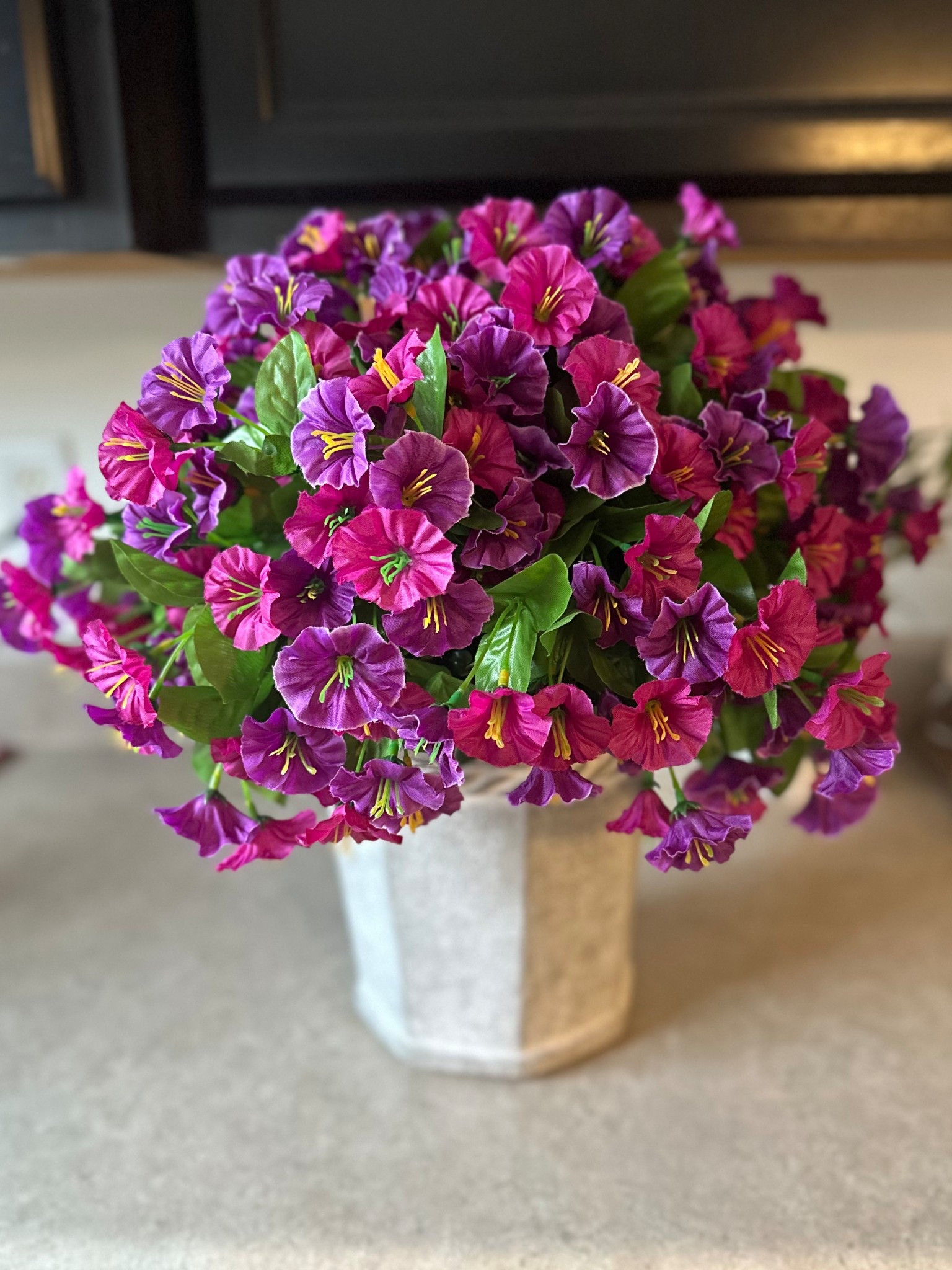 If you’re not quite ready for fall like the rest of social media, these artificial flowers are gorgeous for your summer porch or patio!  I’m so happy with the quality and sheer amount of flowers that come with this Amazon find!  It’s actually sold as a hanging basket, but I decided to put it in this studio McGee concrete planter from Target!



#LTKHome #LTKSummerEdit #LTKSaleAlert