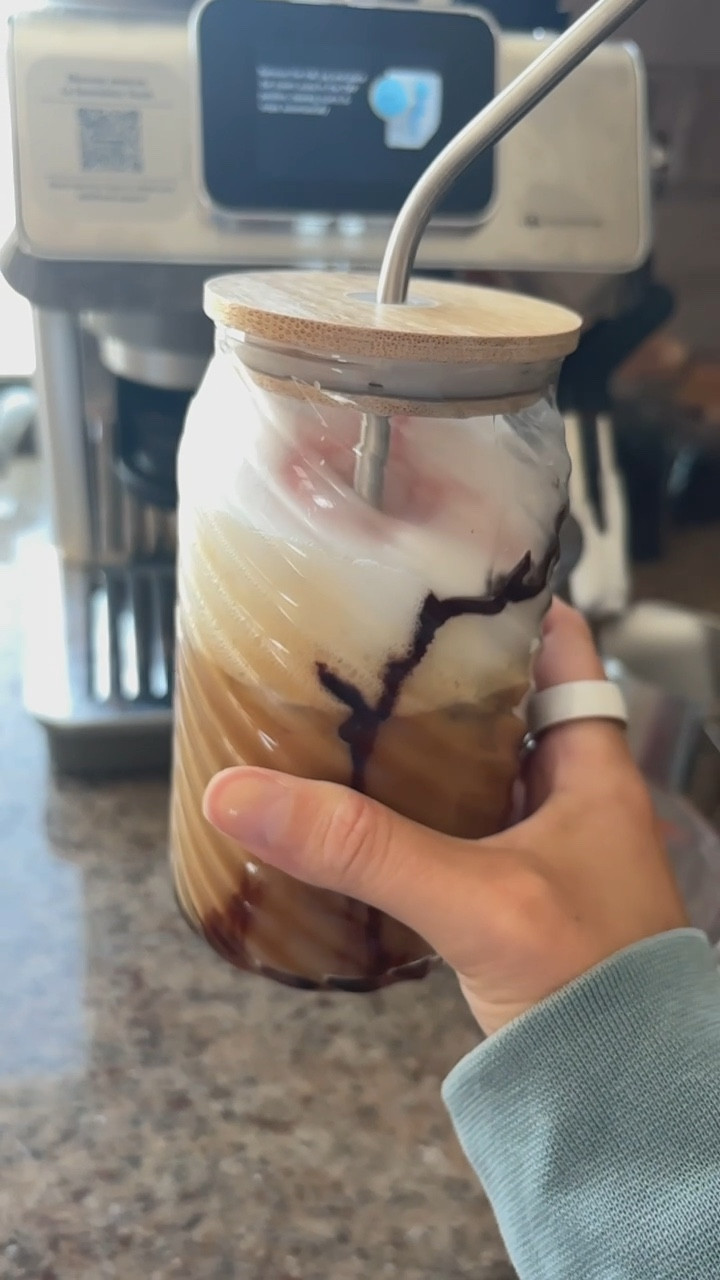 Raspberry mocha iced latte recipe ☕️
-2 shots espresso
-4oz milk of choice (frothed)
-Ghirardelli premium chocolate sauce
-Homemade raspberry syrup (simmer 1/2 cup raspberries with 2 TBS male syrup, 1/4 cup water and TSP vanilla extract in a sauce pan for about 10 minutes)


Products including espresso machine and glass coffee cups with lid in link in bio on my LTK. I may earn a commission. 

#LTKFamily #LTKHome #LTKFindsUnder50