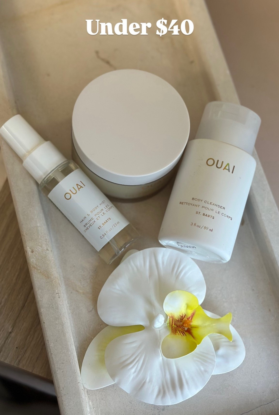 Under $40! 
The scent that makes you want to GET-A-OUAI comes with its own travel bag and can be packed in your carry on! My summer scent #summer #beauty #scent #hairandbodyspray 
