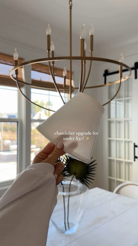 I always knew this chandelier should have come with shades ✨ -I grabbed these off Amazon, they clip onto the light bulb and instantly I am obsessed with this light again, a quick $30 upgrade 🙌🏼 

save + share 🫶🏼
link in my bio + amazon storefront 
#amazon #amazonhome #amazonfinds #chandelier #budgetfriendly #breakfastnook #homehacks #neutraldecor #lightingdesign 

#LTKstyletip #LTKfindsunder50 #LTKhome