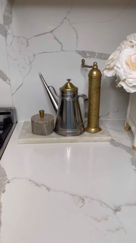 I got this marble tray for my kitchen. But, I wanted it footed, I found these finials and I love the new look. It was a super easy diy. What do you think? 

#LTKhome #LTKstyletip #LTKVideo