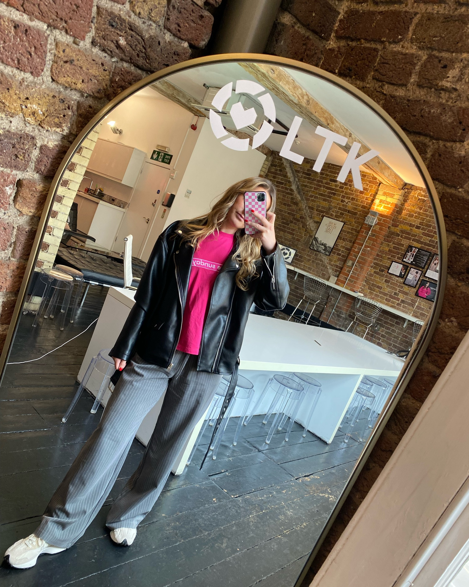 Casual work outfit, workwear, oversized leather jacket, wide leg striped trousers, new balance, rotate Sunday, London street style 

#LTKeurope #LTKworkwear #LTKstyletip