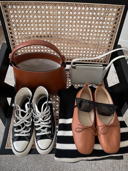 Classic details. Black and cognac color palette. 

Bag - Staud Tellie
Crossbody - Everlane (old)
Sneakers - Converse 5
Flats - Everlane 5
Sunglasses - YSL Mica
Sweater - Rails xs

Petite style, tonal style, neutral outfit, capsule wardrobe, minimal Style, street style outfits

#LTKitbag #LTKshoecrush #LTKFind