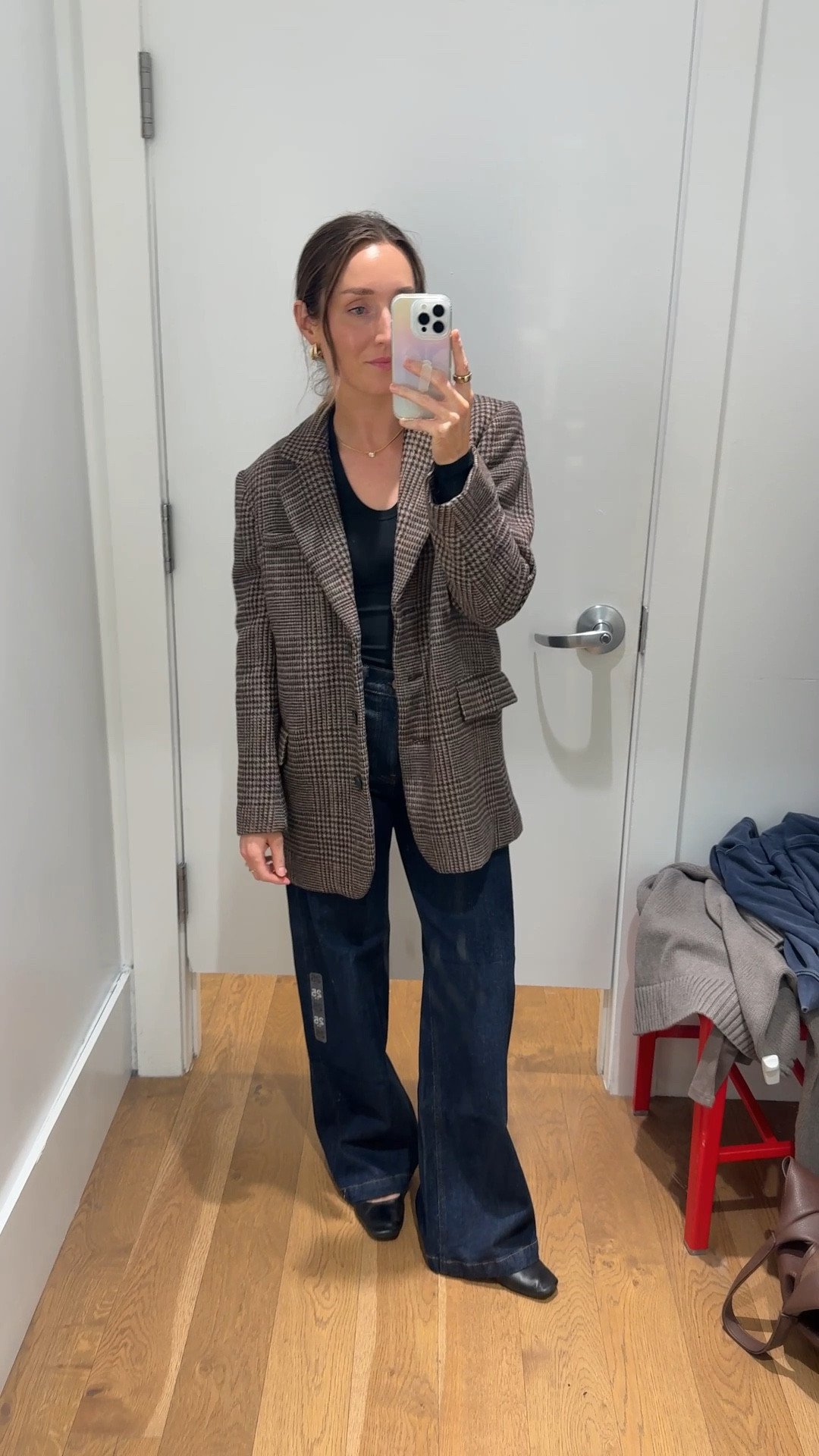 I fell in love with this brown plaid, blazer, and wound up buying it. Definitely size down one. Wearing an extra small and it’s still oversized. The current sale is the lowest price I’ve seen!