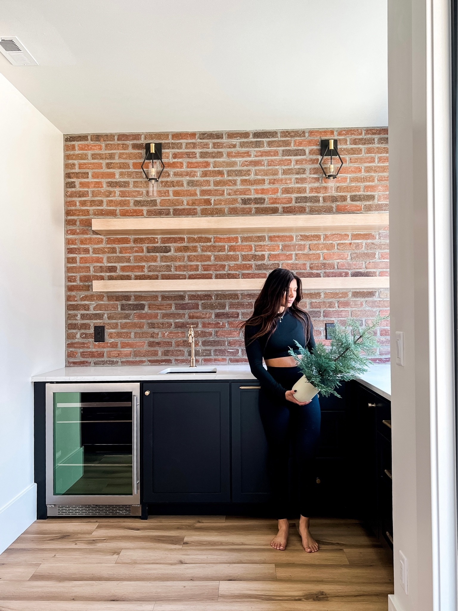 This is our basement wet bar! Love the brick detail and I couldn’t help but put this cute little fluffy tree in the corner. 

#LTKSeasonal #LTKhome #LTKHoliday