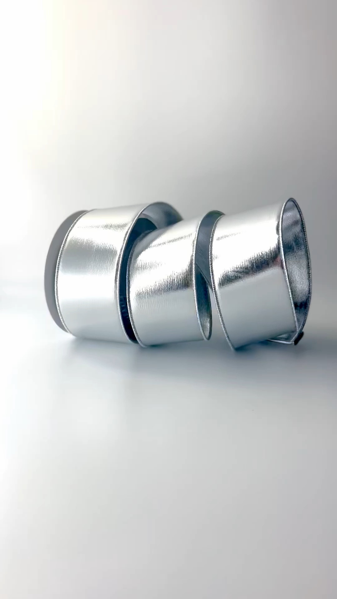 Love this silver wired 2.5 inch mirror mirror ribbon by Farrisilk.  It was the perfect accent ribbon in my bows in my Reindeer Forest collection.

#LTKHoliday #LTKSeasonal #LTKhome