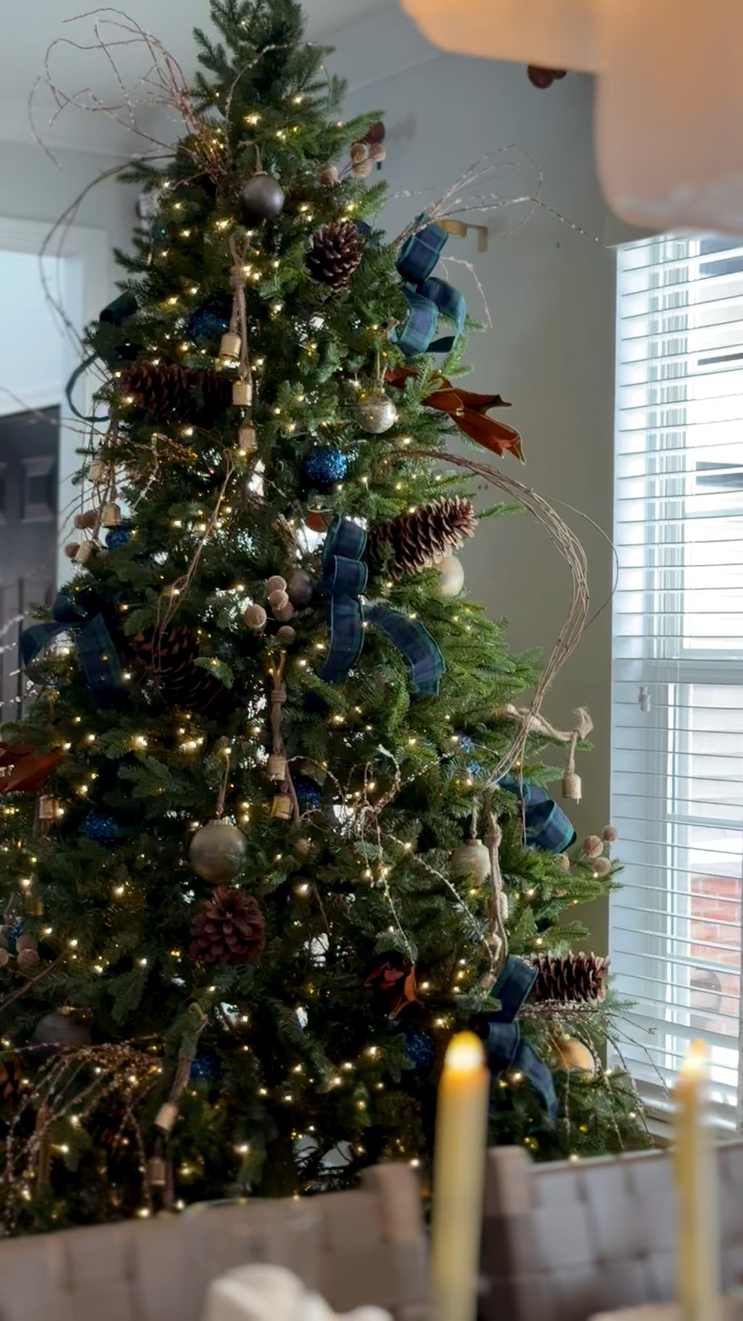 A dining room view of my Christmas tree for 2025. My Crate & Barrel ornaments are on sale. I’ve had them for several years and I’ve added to my collection, over the years. 

#LTKSaleAlert #LTKHome #LTKHoliday
