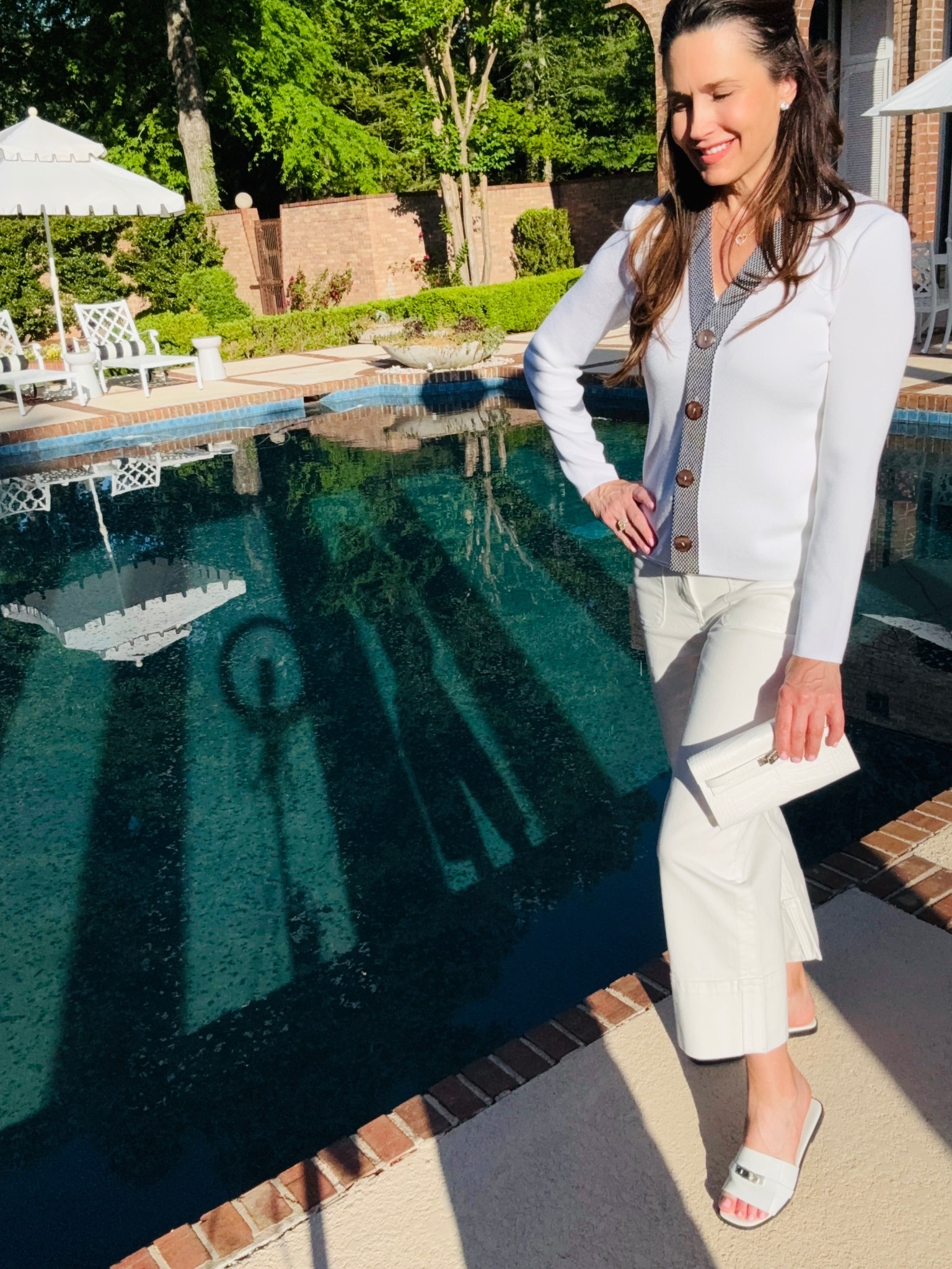 White Cardi + White Denim = Effortless Spring Uniform

Spring's here with Summer on its way! 
My roses are blooming and hydrangeas are beginning to green. 

This white cardigan set welcomes this Spring weather. A knit cardi with black textured trim, shell underneath along with cropped wide leg jeans give minimal color, but maximum impact. 

Newly launched collection by @Family_Savvy x @MingWangOfficial embraces timeless style with a modern edge.

#LTKOver40 #LTKgrwm #LTKootd