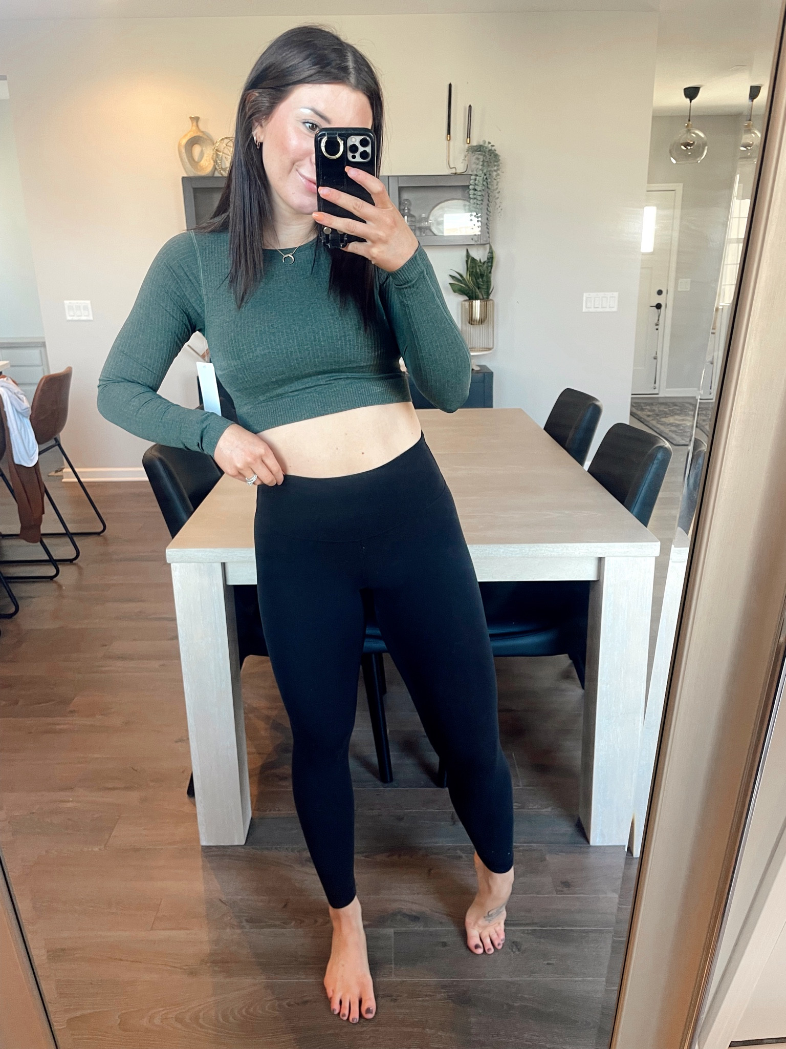 I’m in love with with long sleeve cropped top! It comes with a built in bra so it’s super supportive and comfortable! I love the green color but it also comes in other color options too! Wearing an 8 in the top and 4 in the leggings! 

#LTKunder100 #LTKfit #LTKHoliday