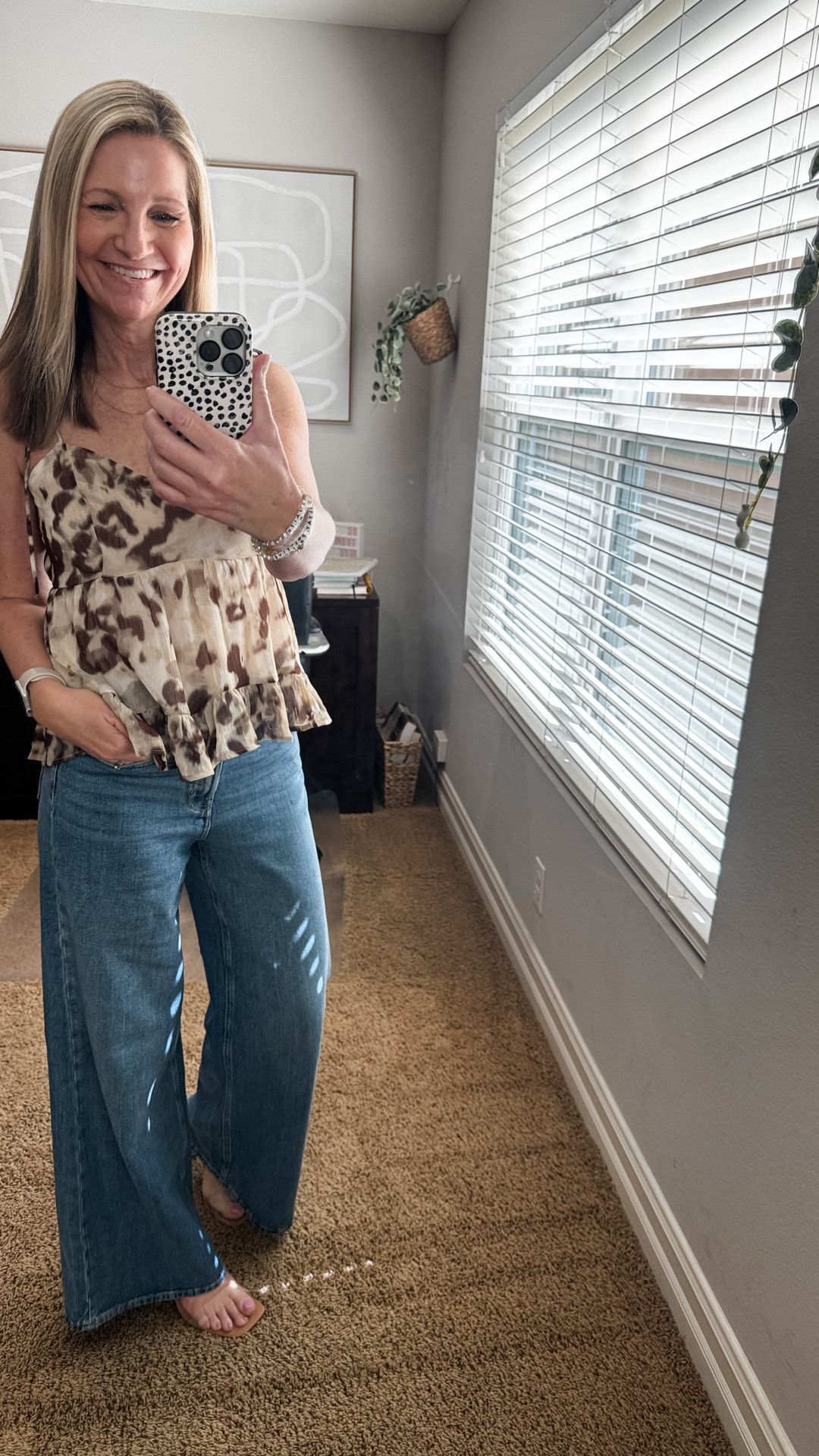 Went into Old Navy to do a return and walked out with this cute animal print peplum top with tie straps. It’s such a cute date night option and is perfect under a light Spring jacket too. 

My wide leg jeans are Old Navy and so comfortable. They are having their big Spring sale so now is the time to grab a few new Spring pieces. 

#LTKSaleAlert #LTKootd #LTKSeasonal