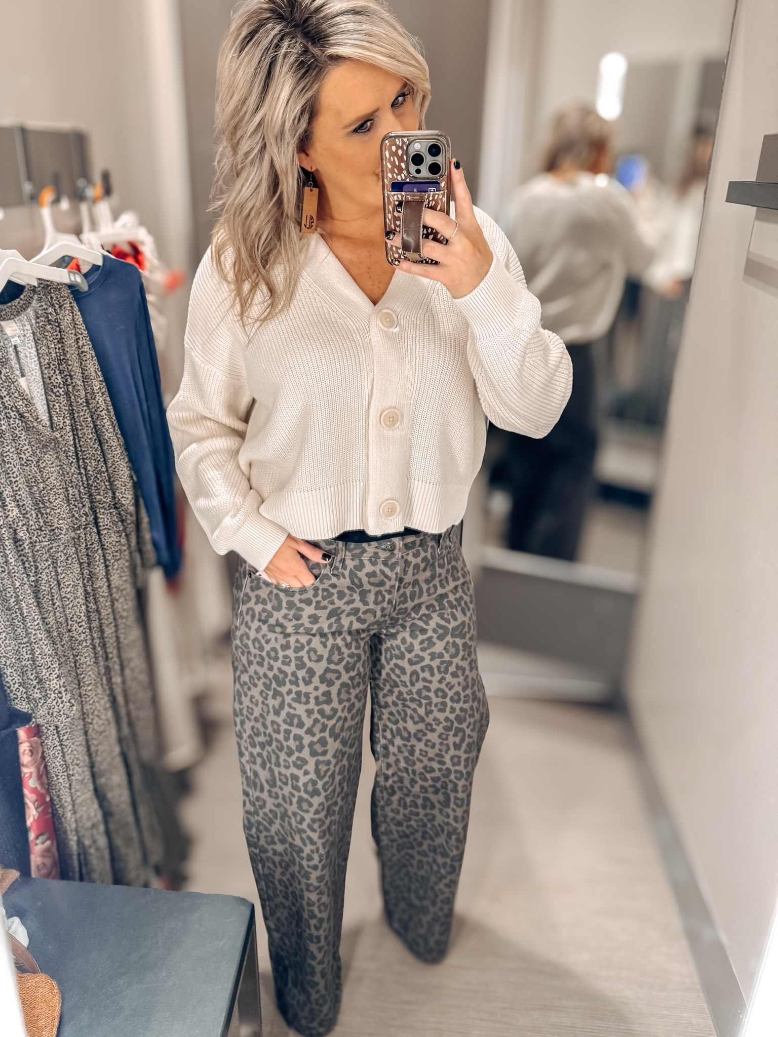 Completely went out of my comfort zone with these wide leg jeans. They are cheetah print though so my heart just HAD to try them. 

Can we talk about this button up sweater? It’s sooo good! They didn’t have my size so I got a XXL and I’m glad I did. It makes for the perfect oversized fit. It also gave extra torso length. 

#LTKMidsize #LTKOver40 #LTKStyleTip